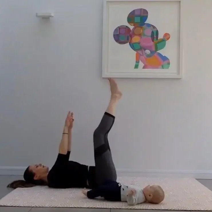 New mum exercising safely with postnatal personal trainer Zara Smalley outdoors in Clapham Battersea and Chelsea SW11