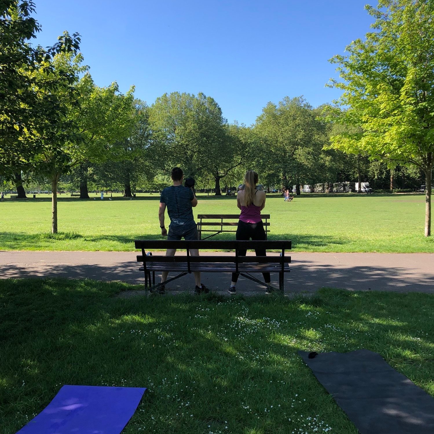 Home personal training in Chelsea with Zara Smalley coaching client in living room workout