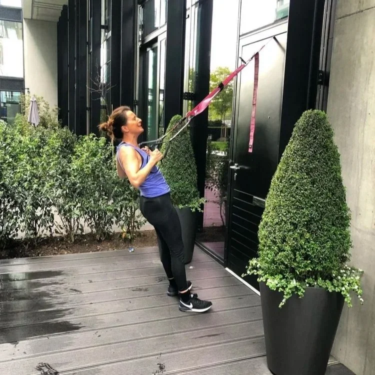 TRX suspension training outdoors in Battersea Park, South West London