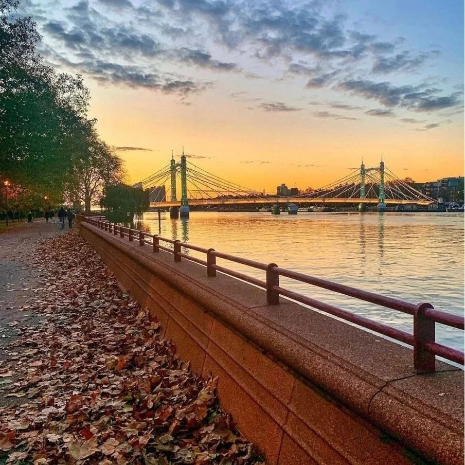 Female personal trainer in Clapham leading outdoor workout near Clapham Common