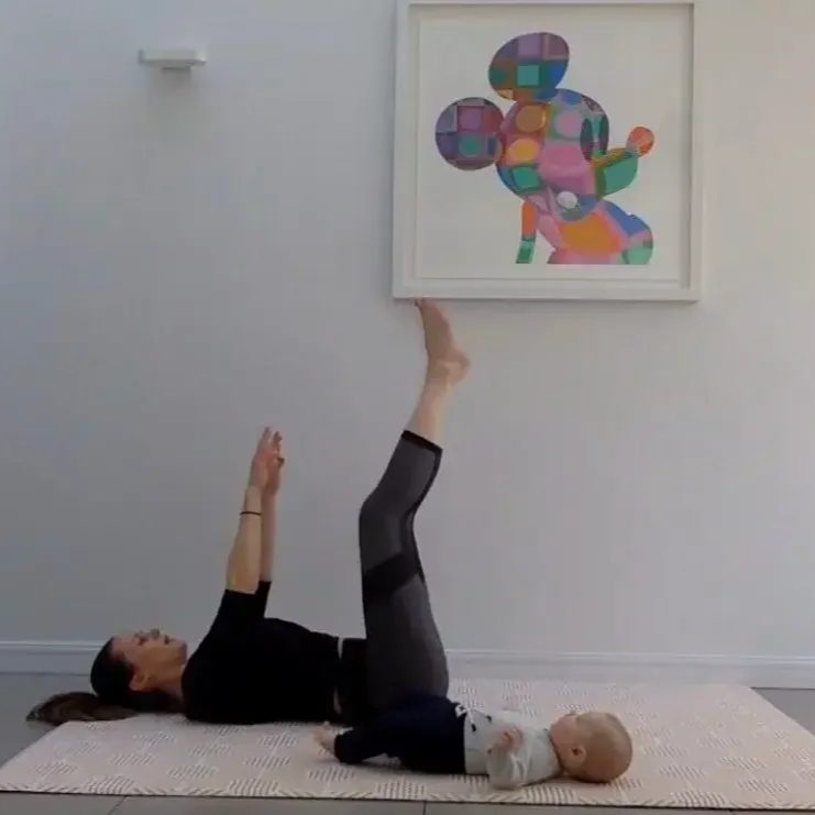 Mum training with baby — postnatal personal training in Chelsea with Zara Smalley