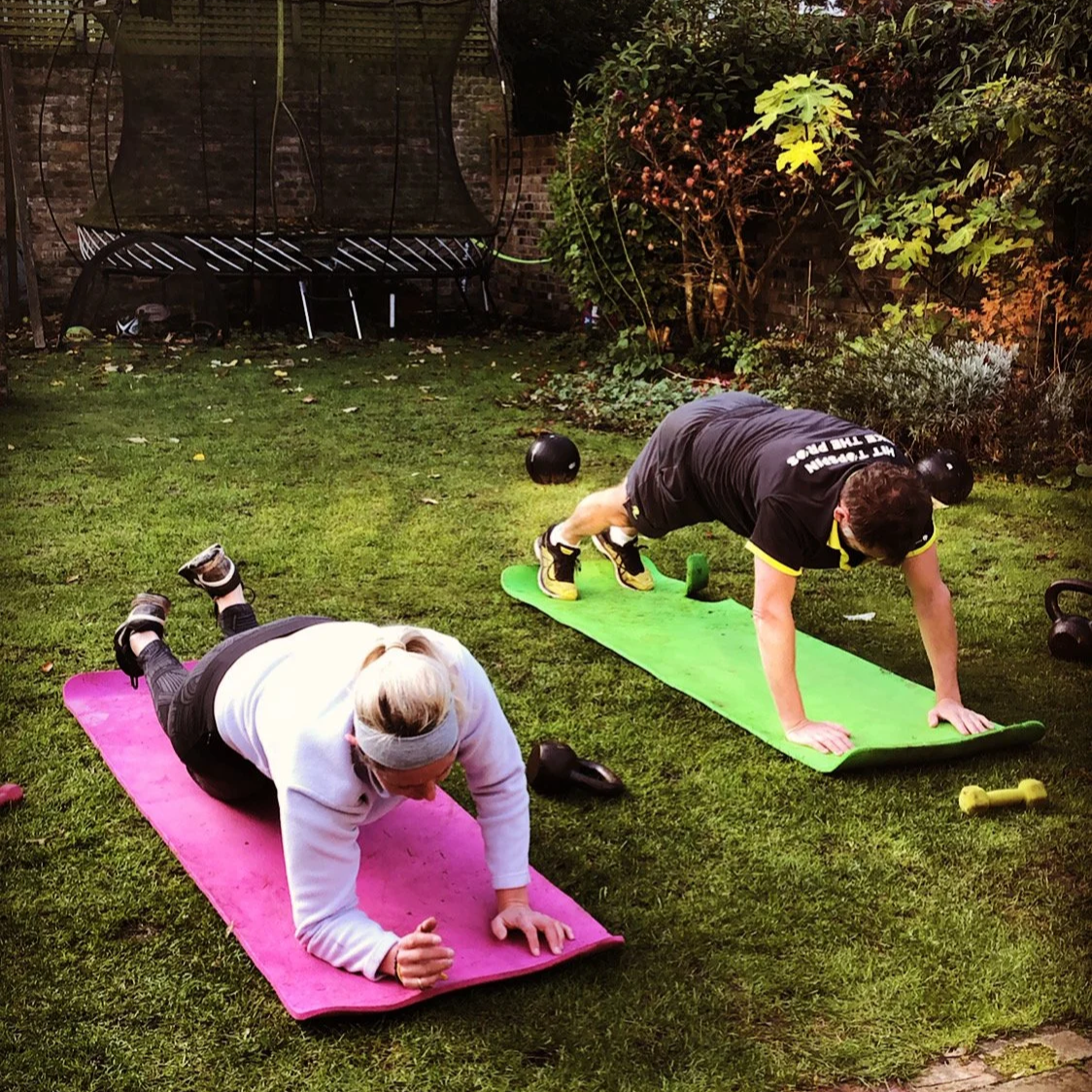 Female personal trainer in Wandsworth demonstrating correct exercise form