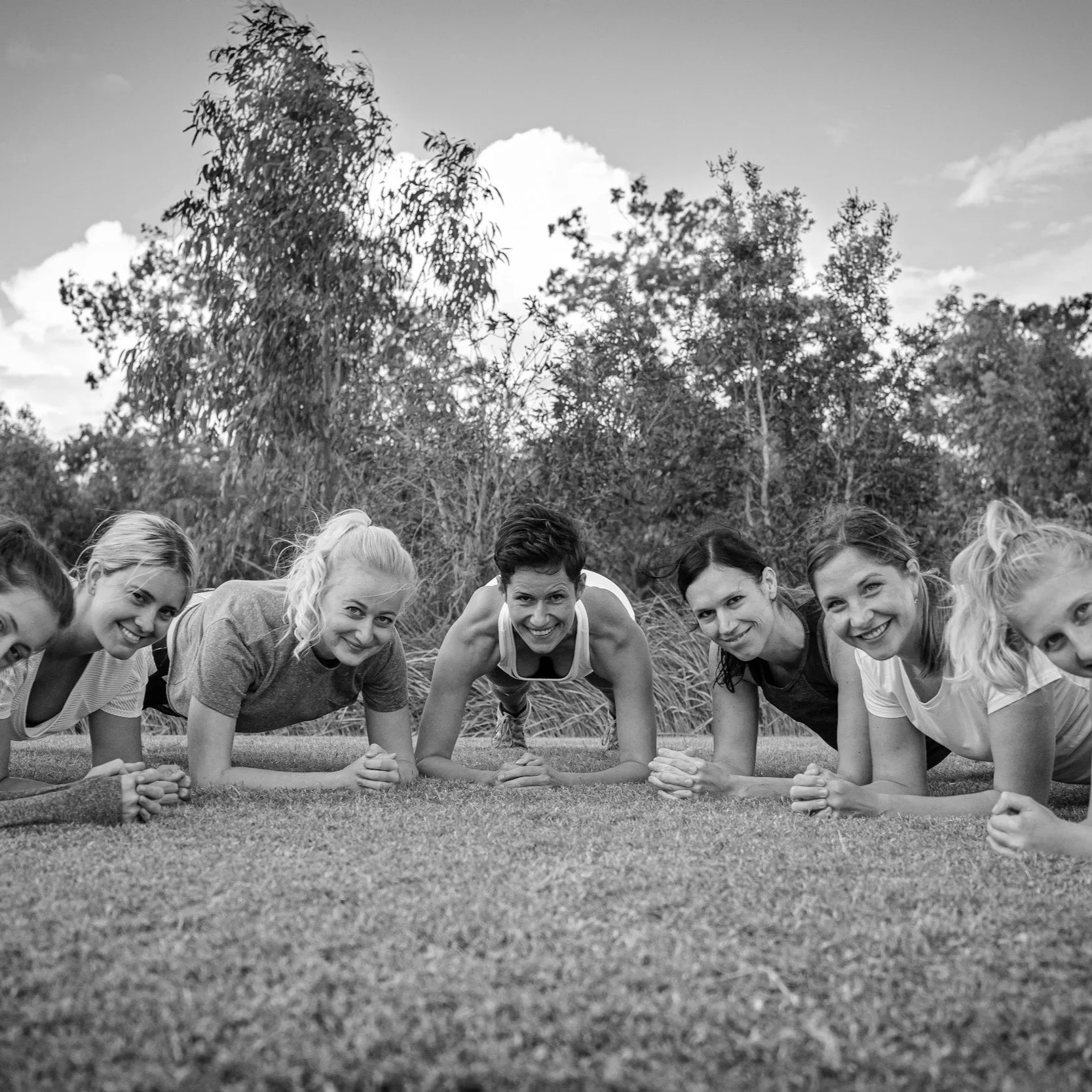 Early morning outdoor bootcamp class on Clapham Common south London