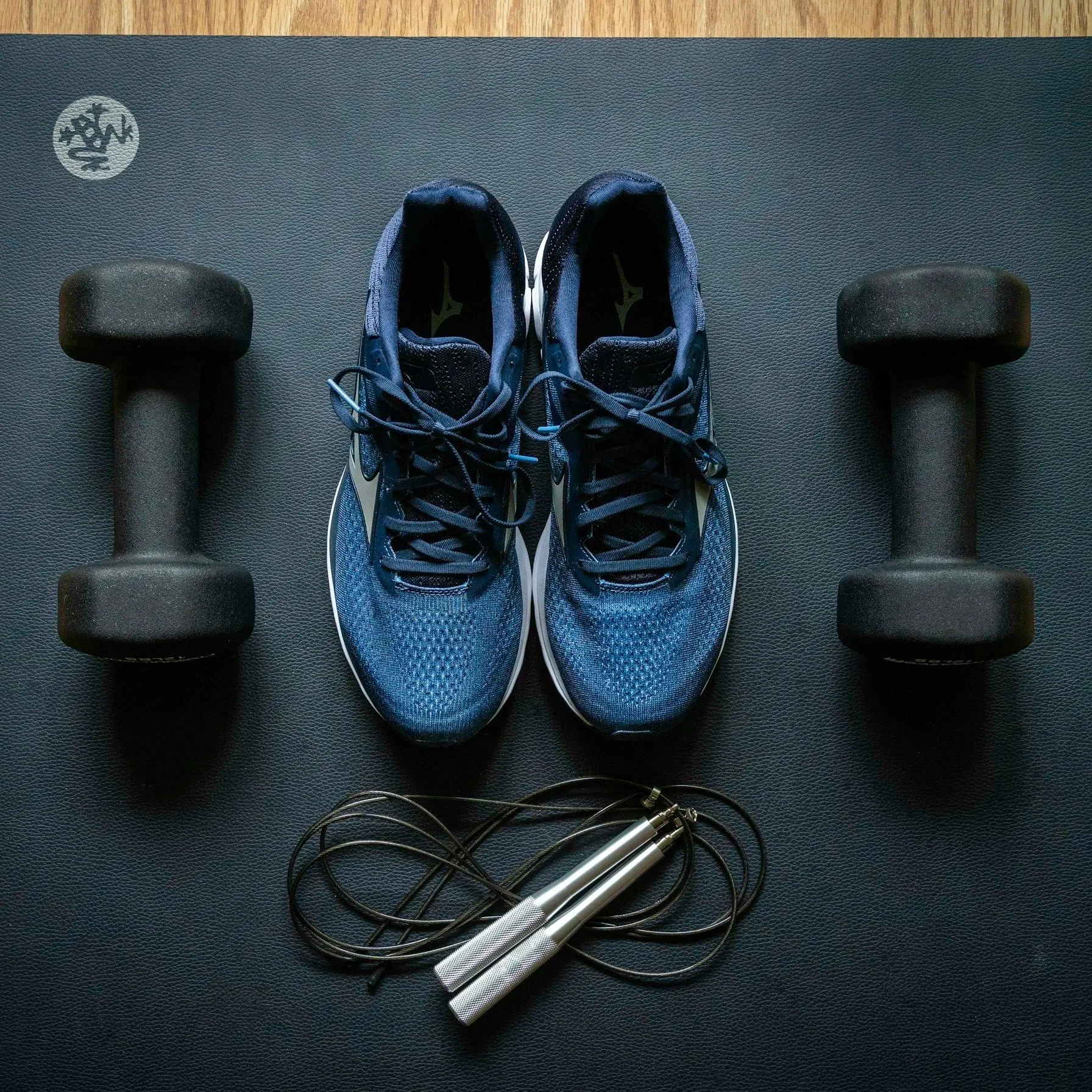 Dumbbells laid out for a personal training session in South West London