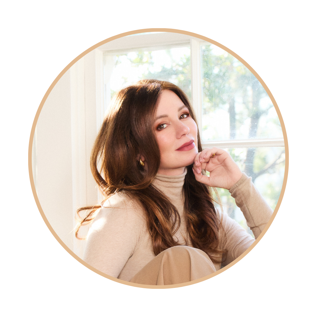 Naomi Whittel, wellness author of Glow15, portrait headshot in soft natural light by a window.