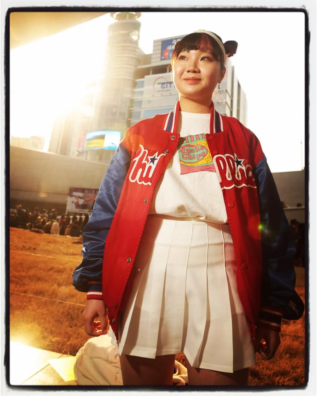 Rocking that baseball/ sukajan thing with the white tennis skirt. 
