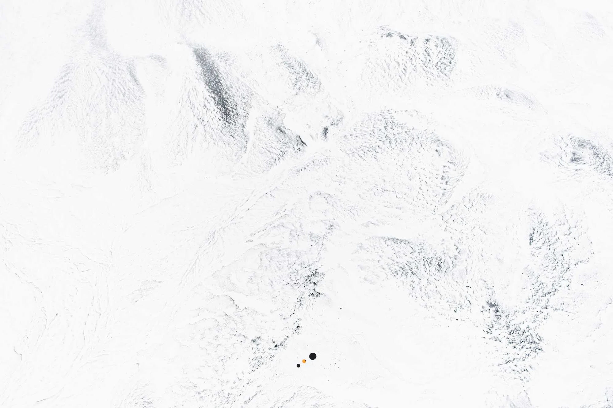 The artwork shot from above look tiny in the vast landscapes.