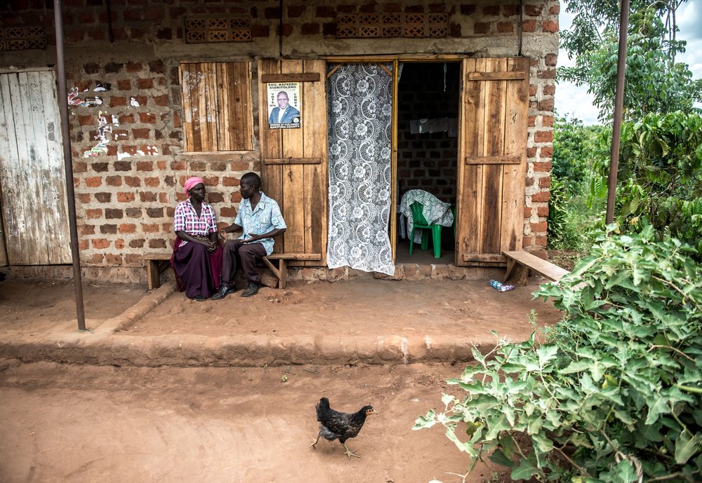 The house where John lives in his village Kakoge