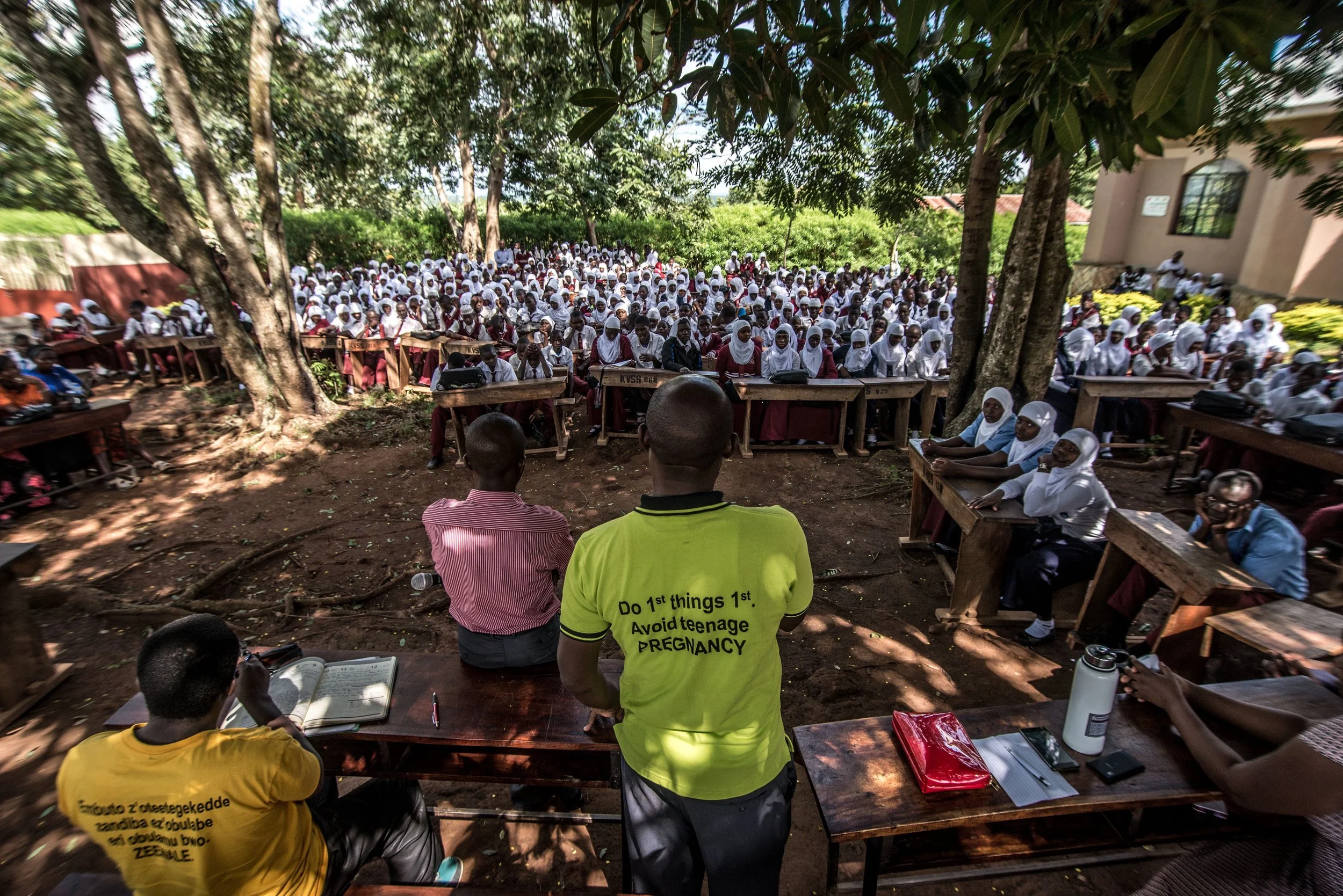 Teachers at a secondary school in Kasana providing information on sexual and reproductive health