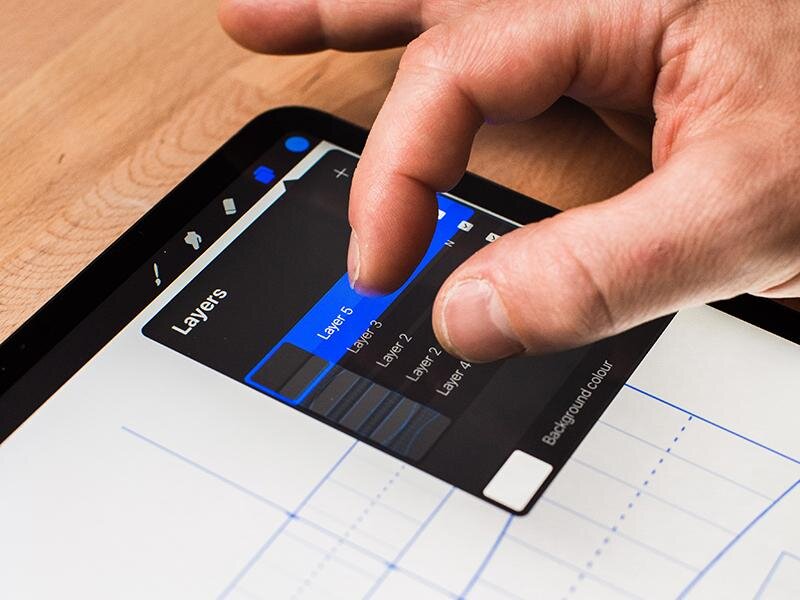 6. Once you’re happy with your layout, pinch together all the Grid layers to flatten it. Reduce the opacity of the flatten layer by clicking on the ‘N’ symbol.