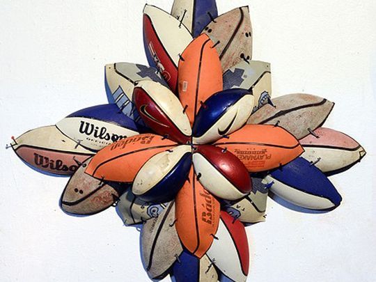 Brandon Donahue, "Basketball Bloom USA Nike," 2017, basketballs and shoestrings. (Photo: Photo courtesy of Oz Arts)