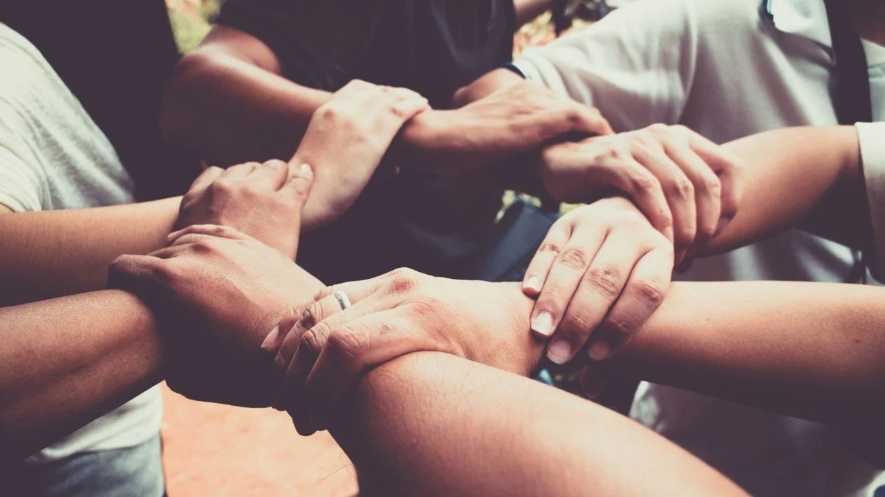 together for good locked arms.jpg