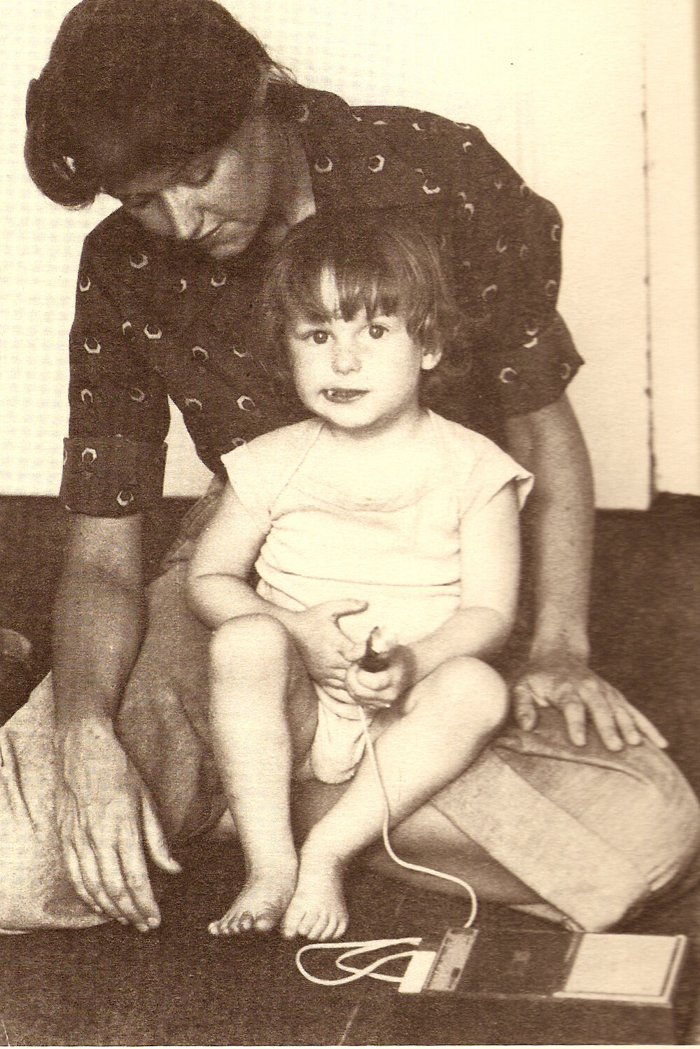 Portrait of artist Mary Kelly and her son, Kelly Barrie (1975).