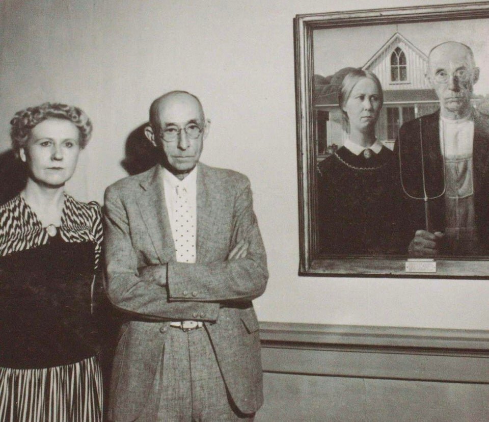 Nan Wood and Dr. Byron McKeeby standing in front of "American Gothic"