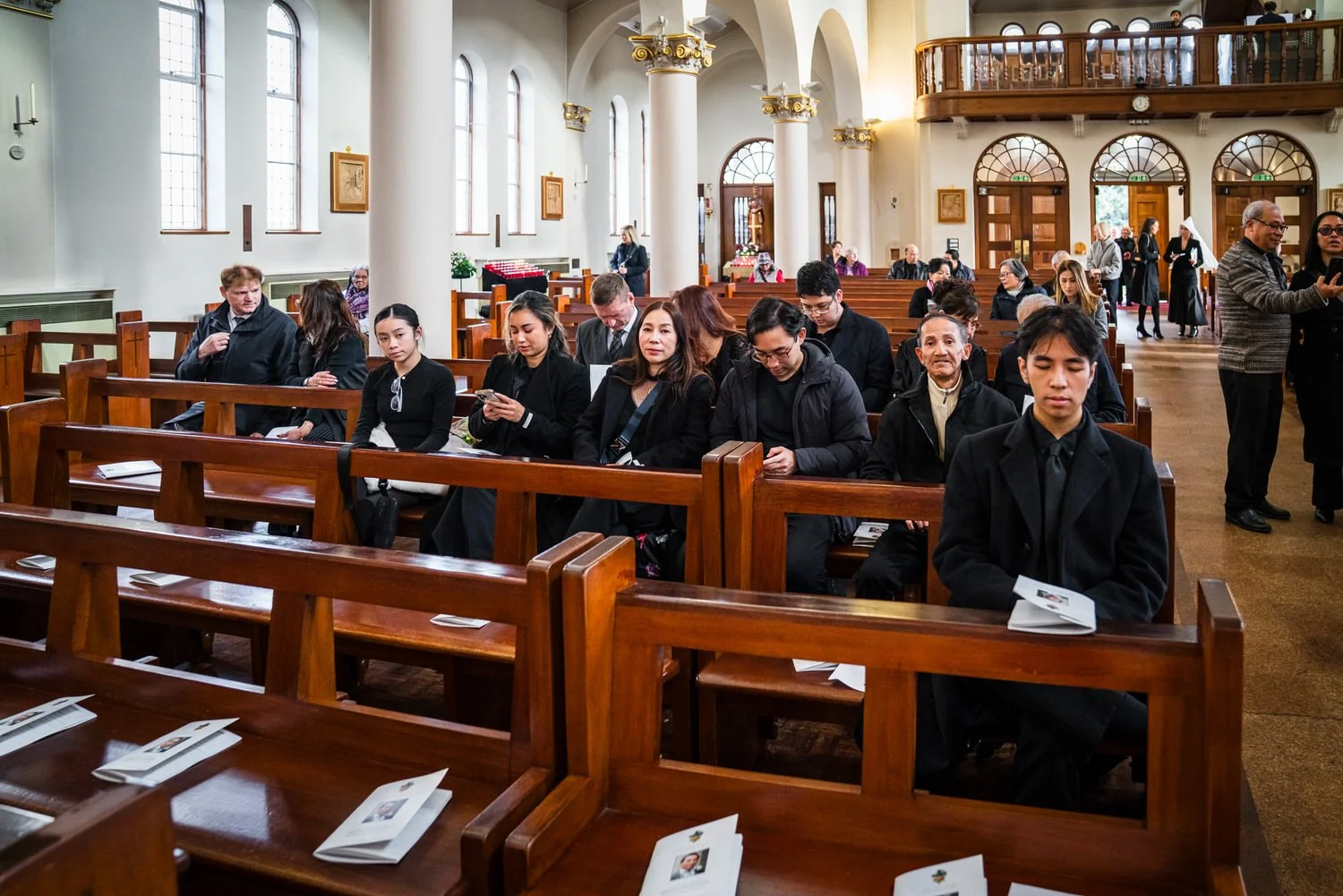 funeral live streaming church congregation London service with family watching abroad