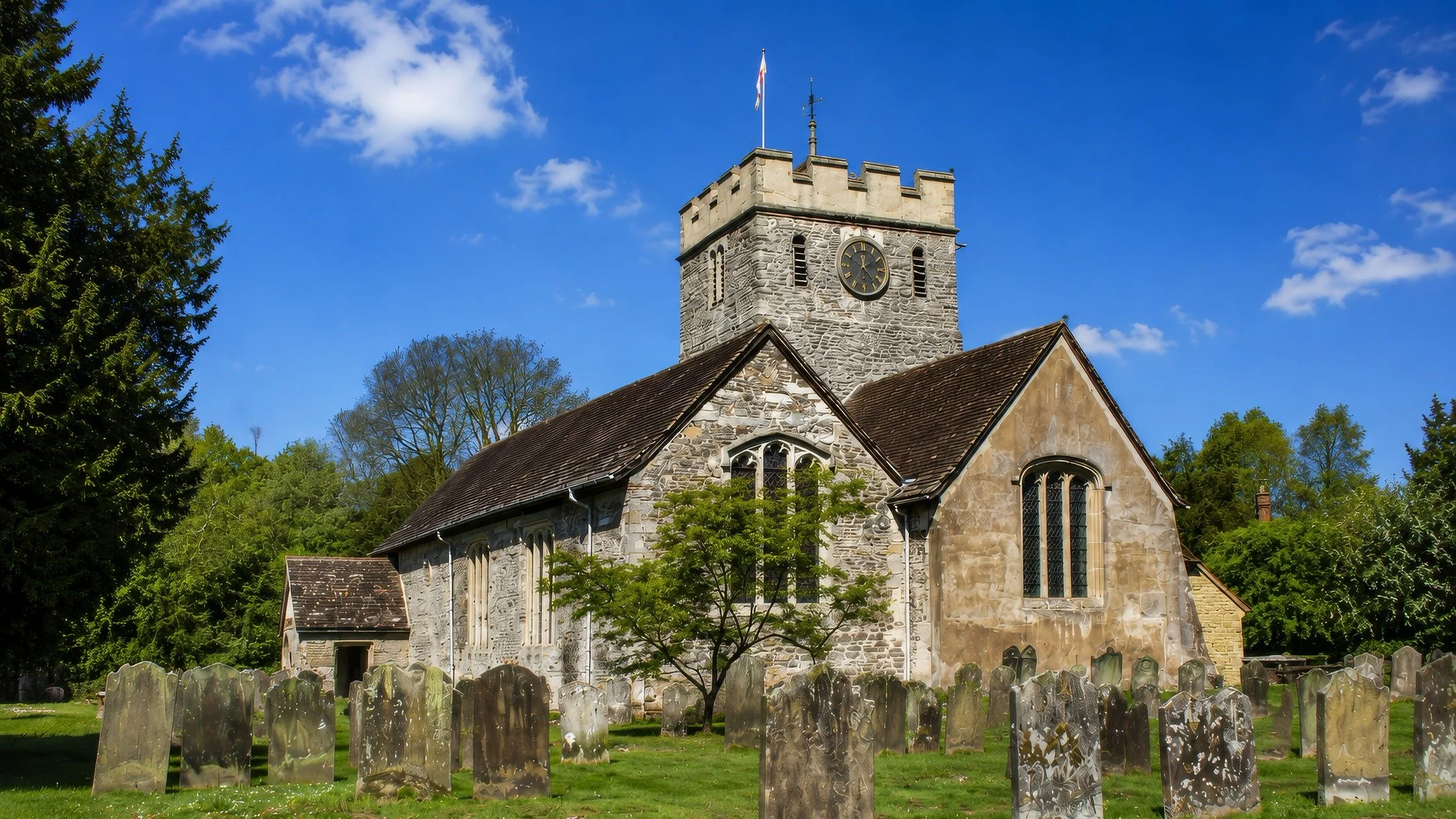 Exterior of St Nicholas' Church, Charlwood, a historic Norman church near Crawley