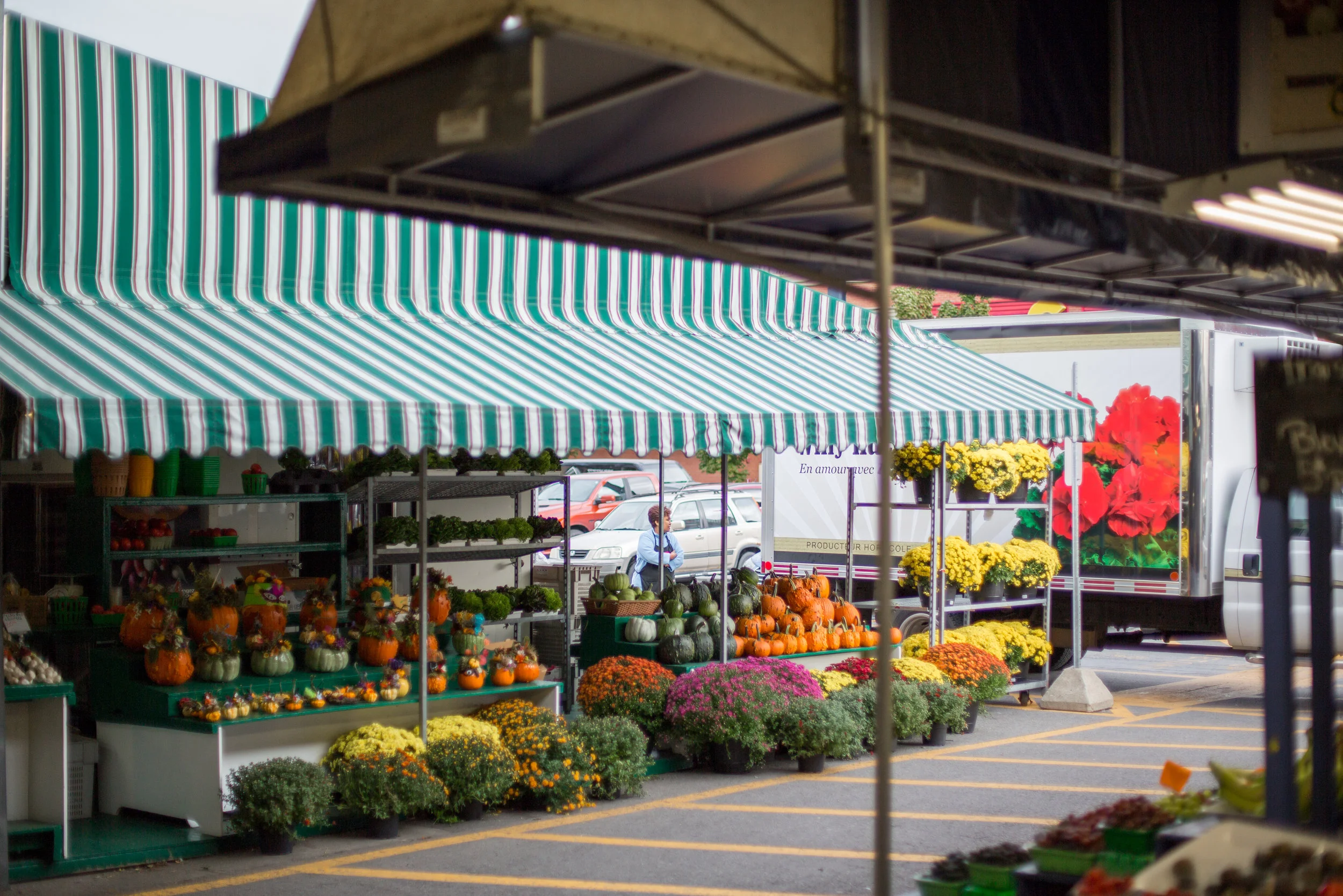 MONTREAL, QUEBEC - SEPTEMBER 28th 2018: Other farmers flock in early in the morning to set up their individual booths at Atwater market, Montreal, on September 27th. (Photo by Matteo Gueli / Dawson College Photojournalism Class)