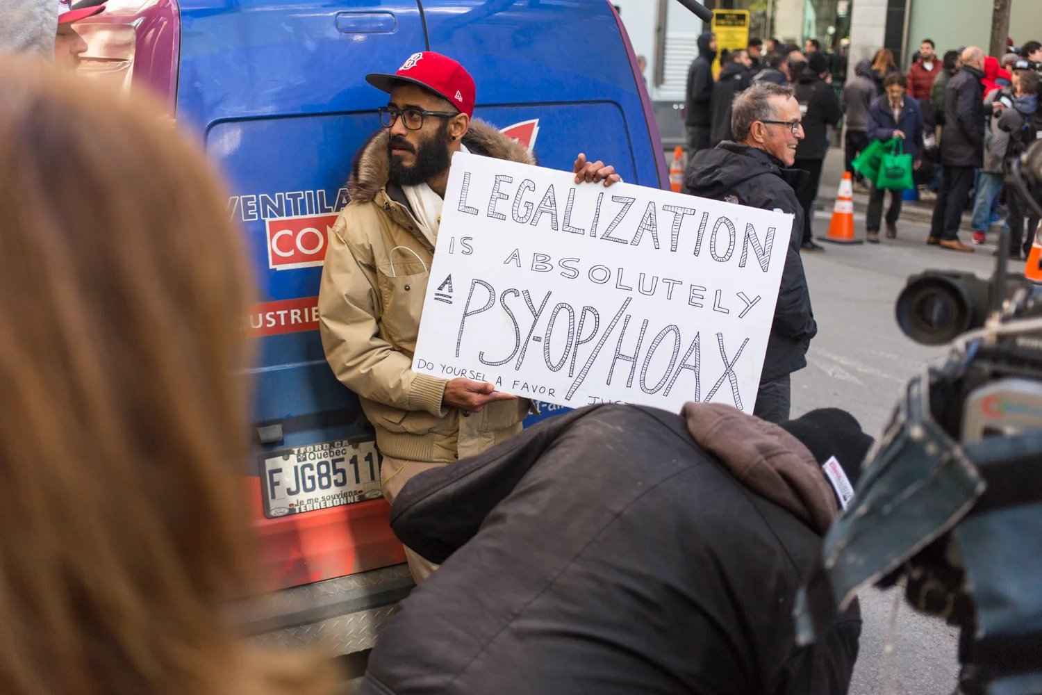 MONTREAL, QUEBEC – OCTOBER 19 2018 : Charlie Canoe, a protester, stands across the street from the Société Québécoise du Cannabis outlet on opening day and attempts to inform the passerby about the risks of the legalization of cannabis on October 17th, 2018 in Montreal, Quebec. (Photo by Matteo Gueli /Dawson College Photojournalism Class)