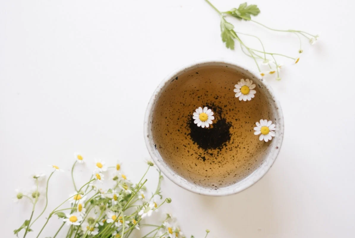 Jenni Kayne beautifully recreates Harvest's recipe for dried feverfew tea bundles with rosemary and mint