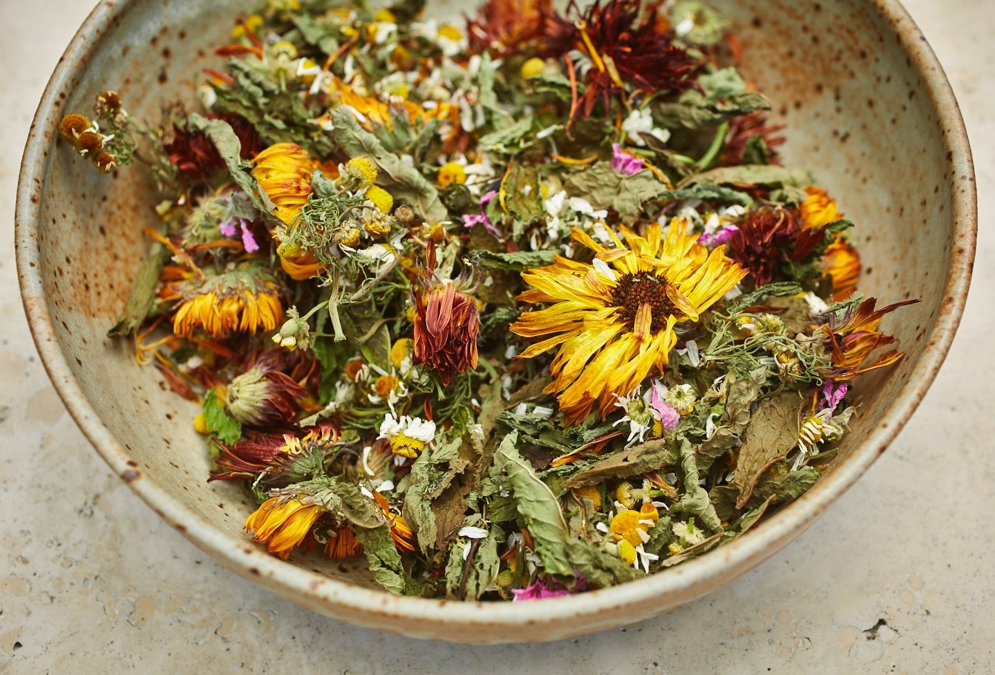 This year&rsquo;s garden-grown tea blend: dried mint, calendula petals, chamomile blossoms, and lemon-meringue scented geranium.