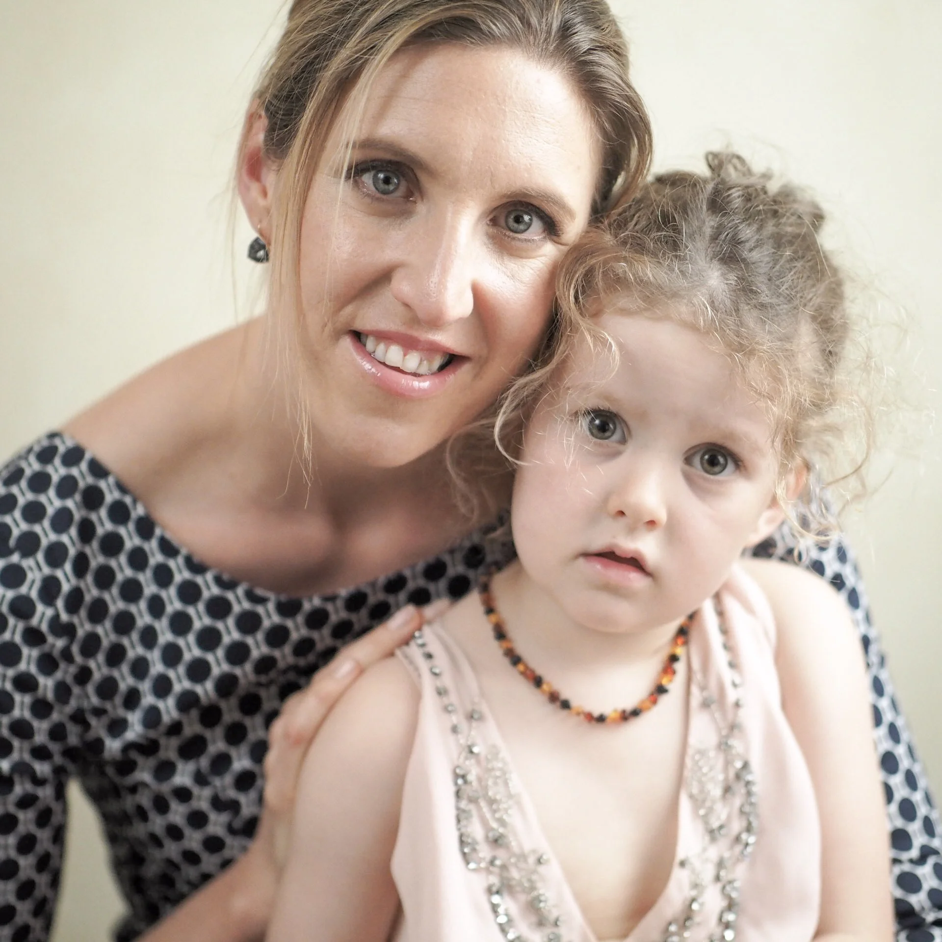 One of my daughters, and one of her twin daughters. 1/160sec, f/1.2, ISO 1600