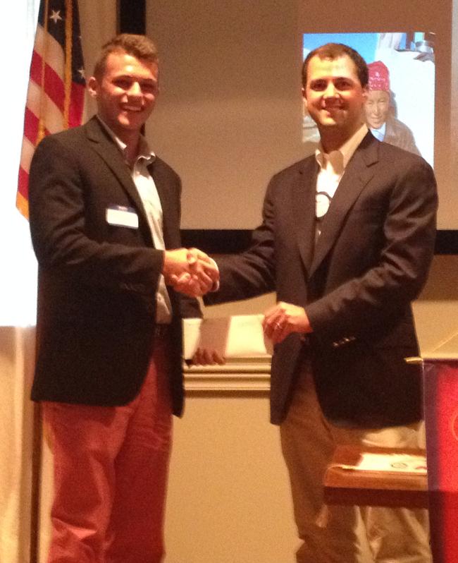 Ethan Courville 2014 Scholarship Runner-Up receives a check for $1000