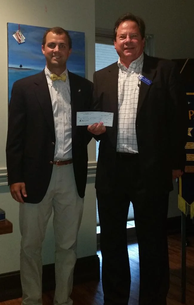 Jack Little receives a check for ECCO (East Cooper Community Outreach. (2015)