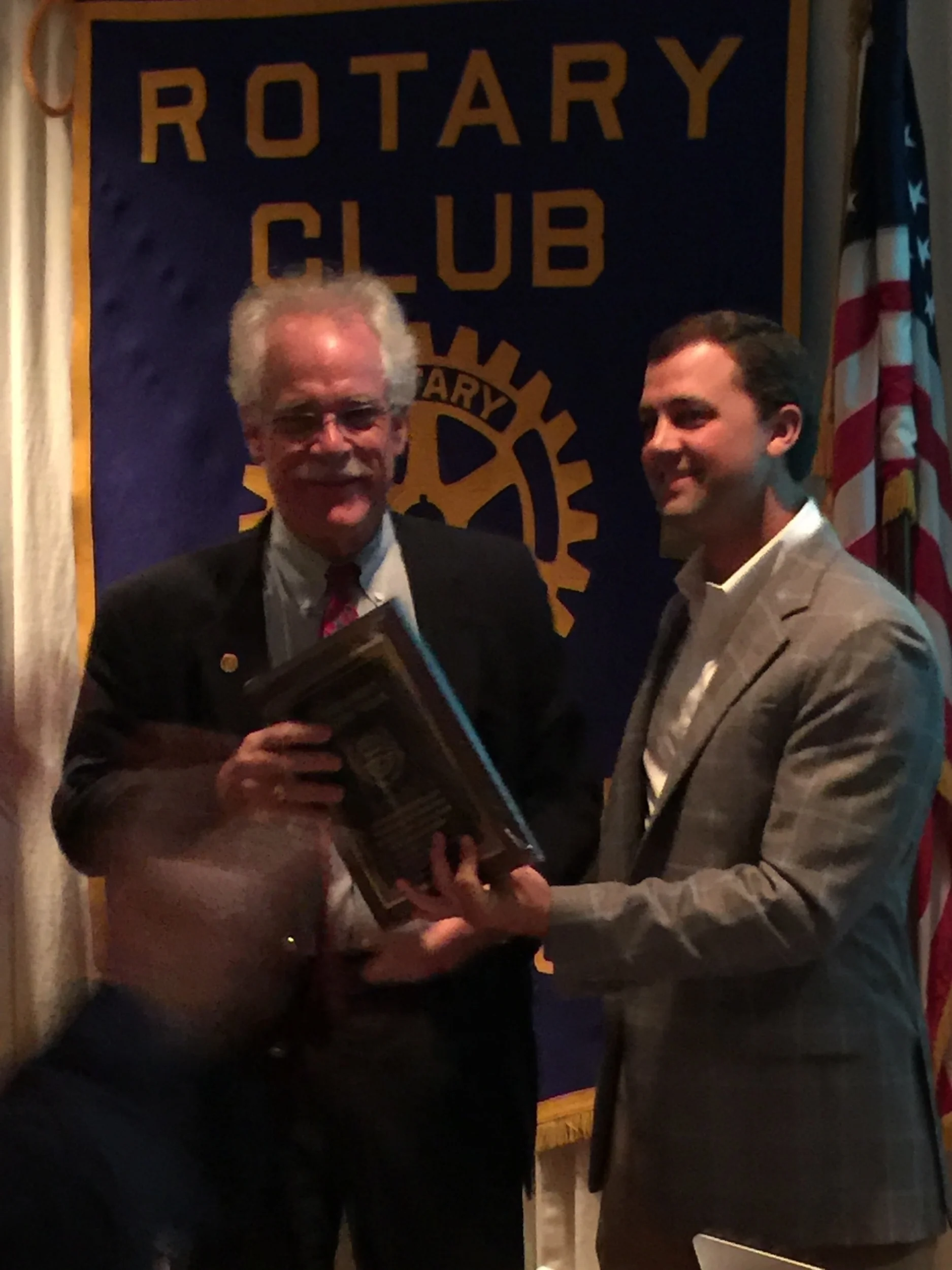 President Rob Crawford recognizes Lewis Lee as Rotarian of the Year.