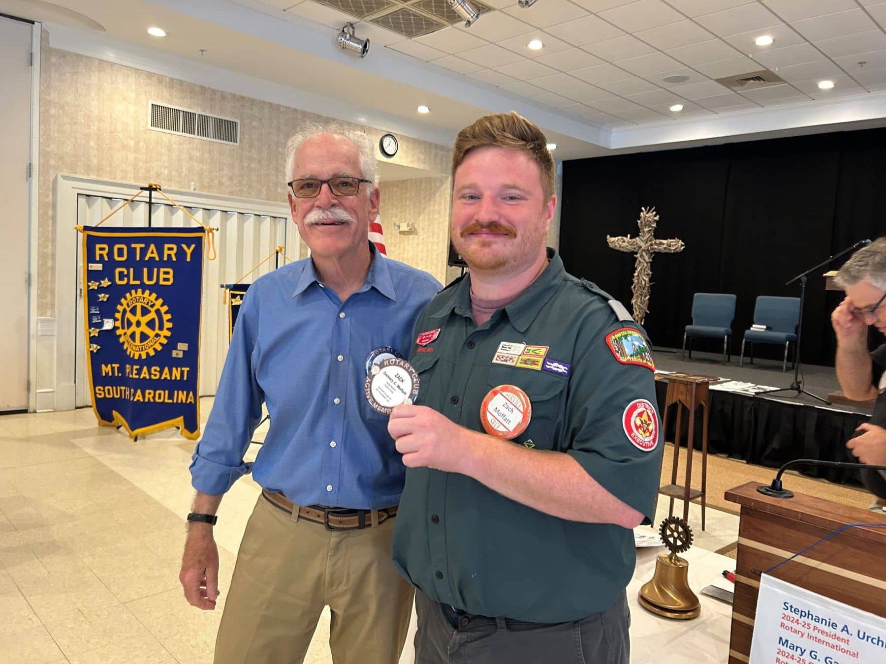 Receiving permanent membership badge