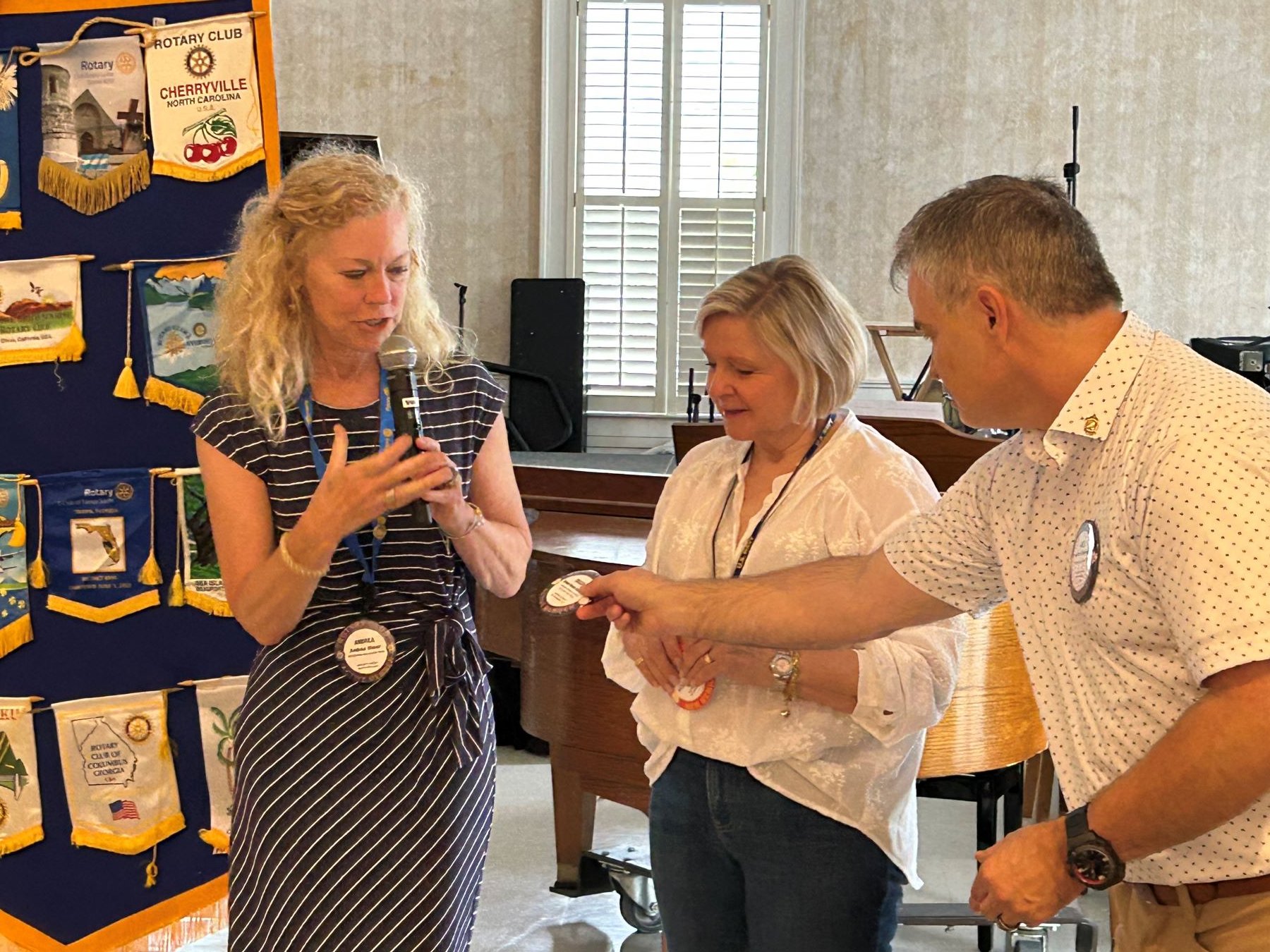 Denise Harrington moves member status...