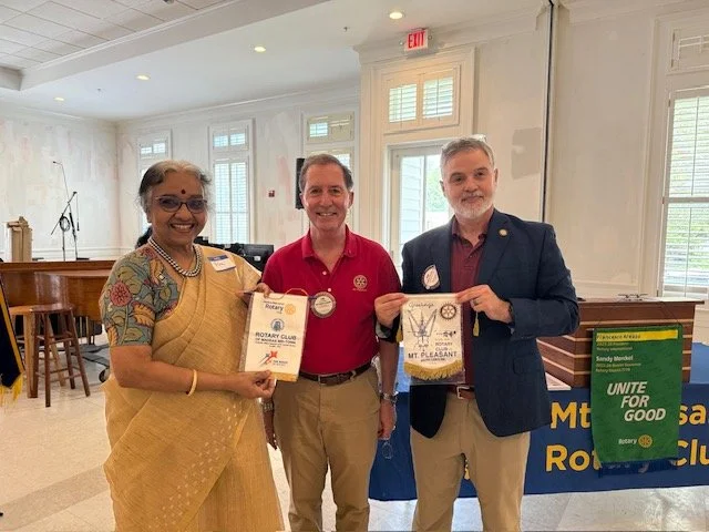 Exchanging Rotary Club flags