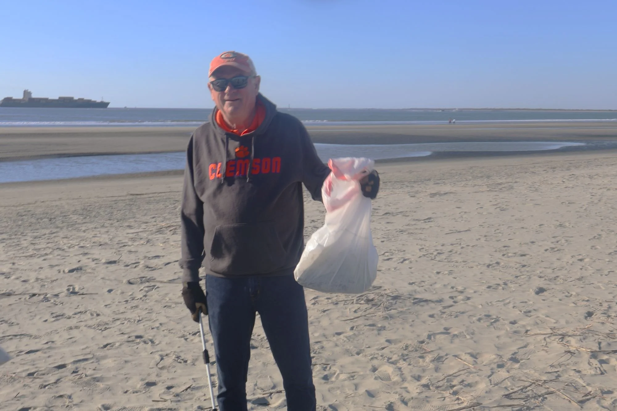 Randolph Tiller collects a bag...