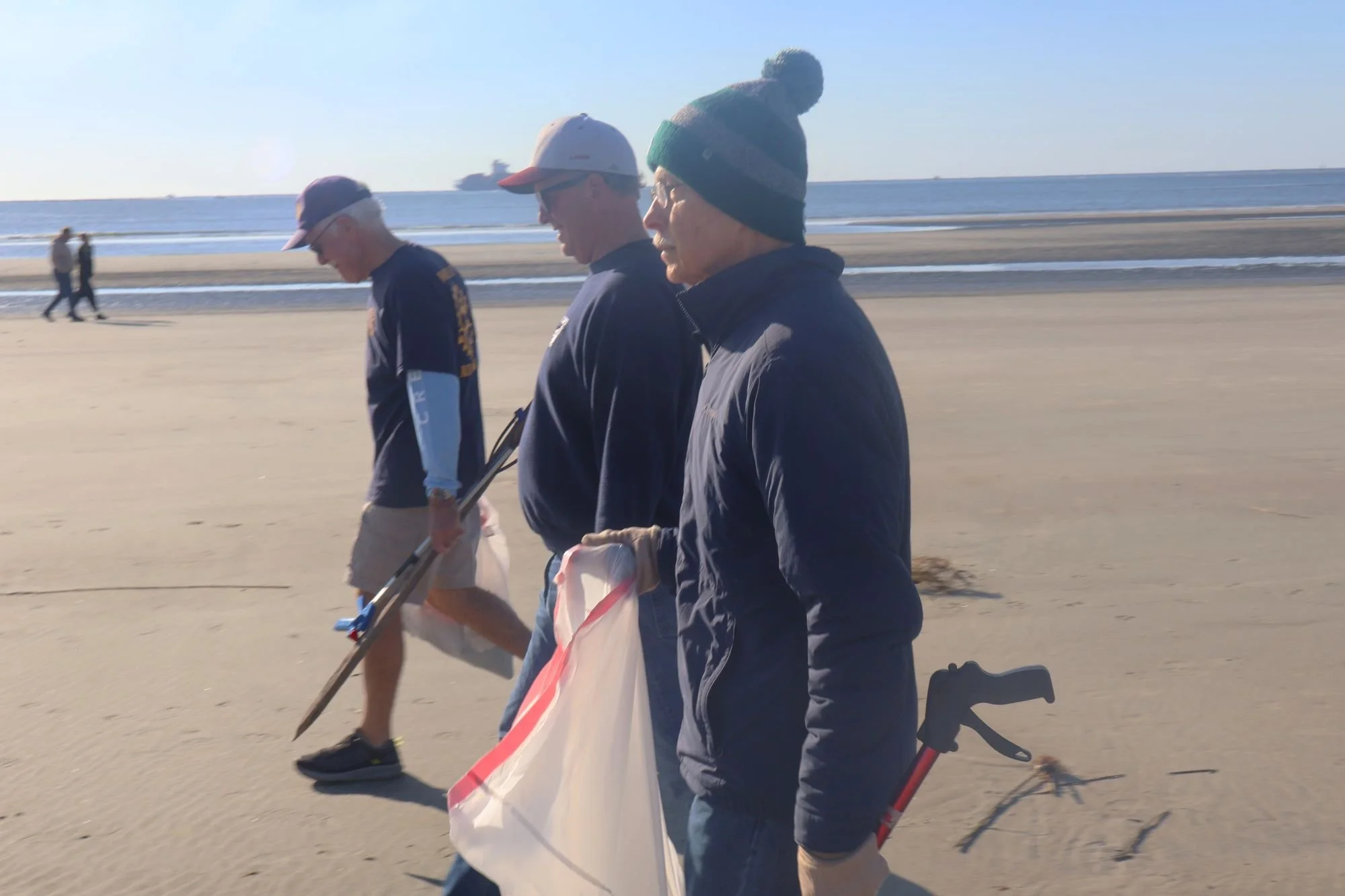 Volunteers sweeping together...