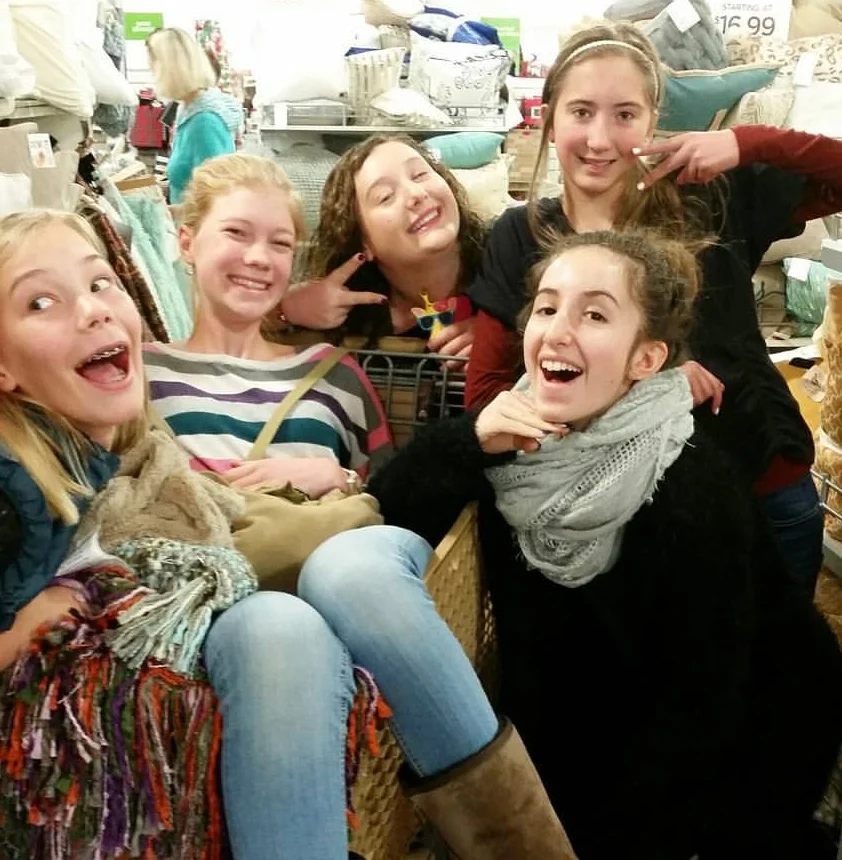 The youth participated in Project Night Night, filling 20 tote bags, each with a blanket, a stuffed animal, and a children's book. The filled bags were donated to Bay Area shelters in an effort to make children in shelters feel safe and warm.