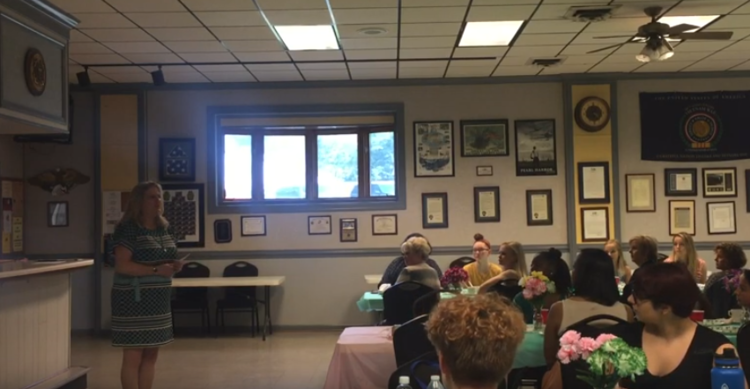 Kim Eley speaking at the Girl Scouts Mother/Daughter Tea on May 21, 2019