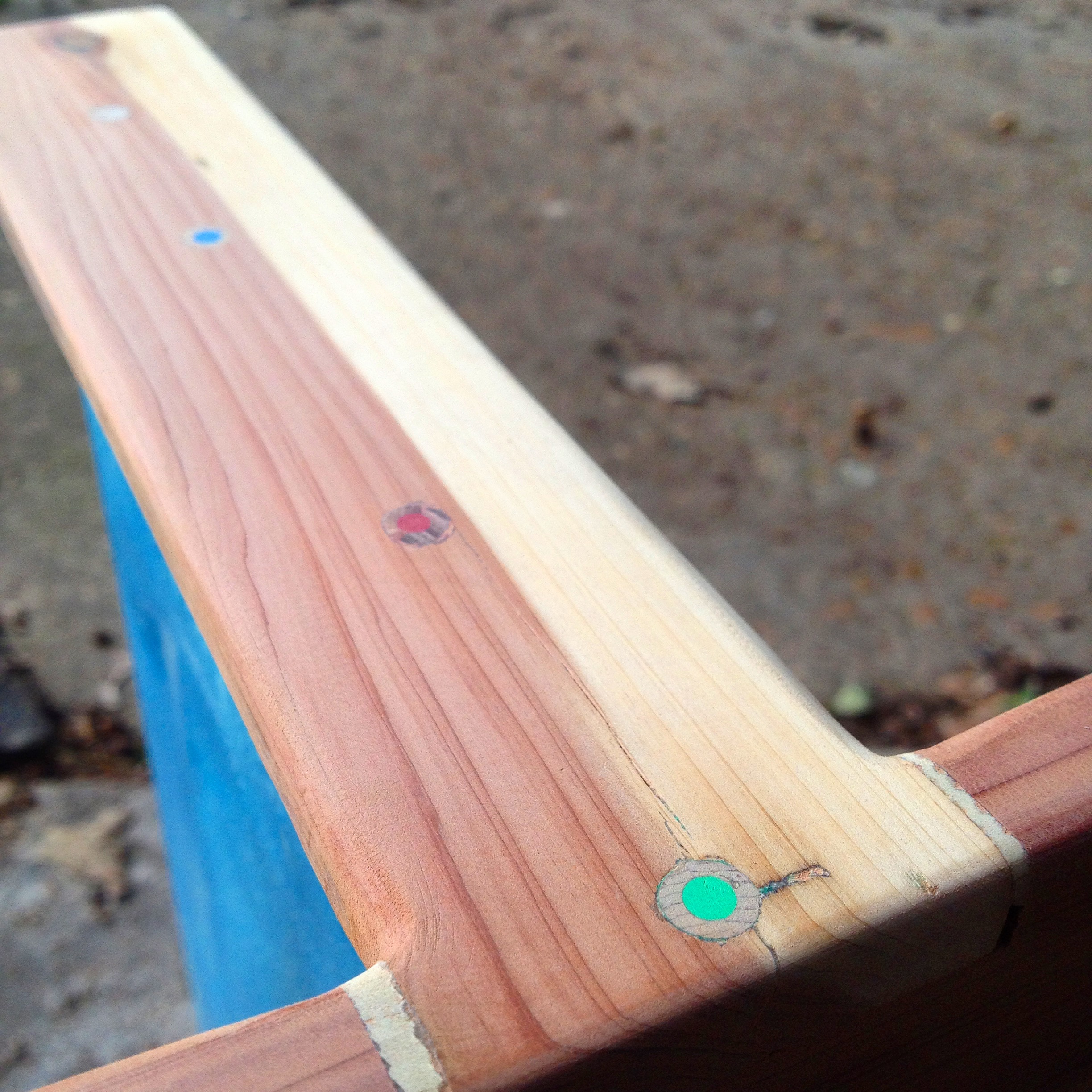  This piece on top is to securely attach the stabilizer board from the top, in addition to the back side and the bottom. It is secured using colored pencils as dowels! I thought it would be a fun way to add spots of color while retaining some classin