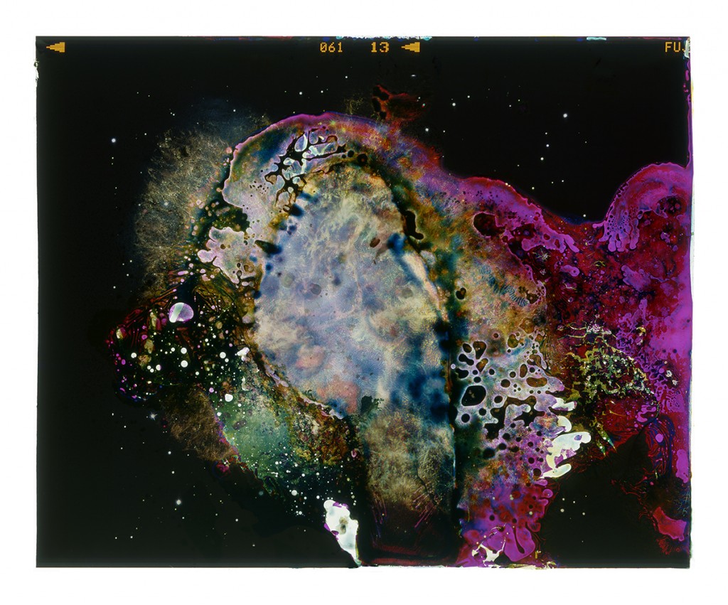 A Photograph of the Crab Nebula Eaten by Bacteria Found on a Table at a Red Lobster Restaurant