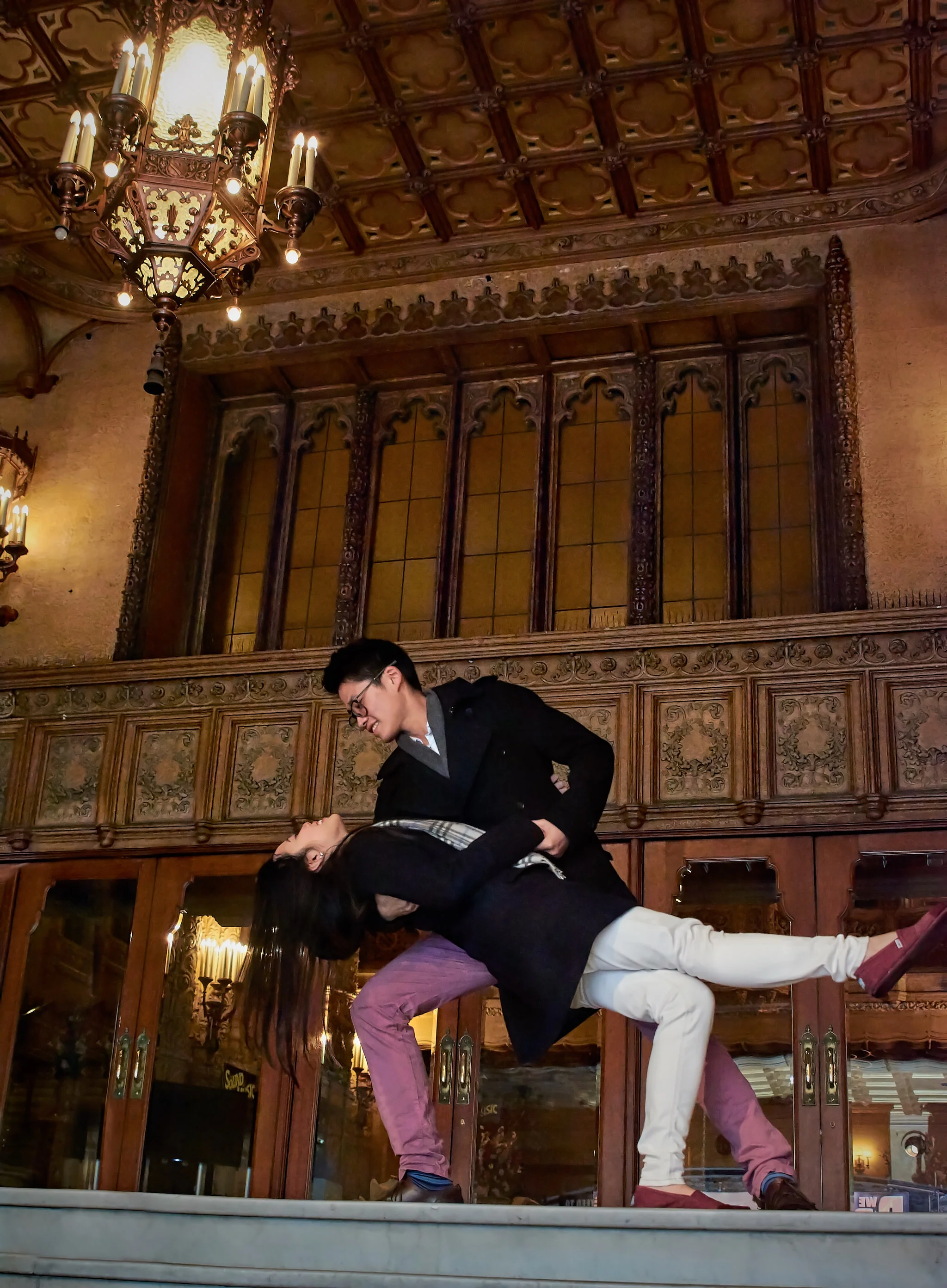Bella and Emerson dancing Regent Theatre Melbourne engagement session.jpg
