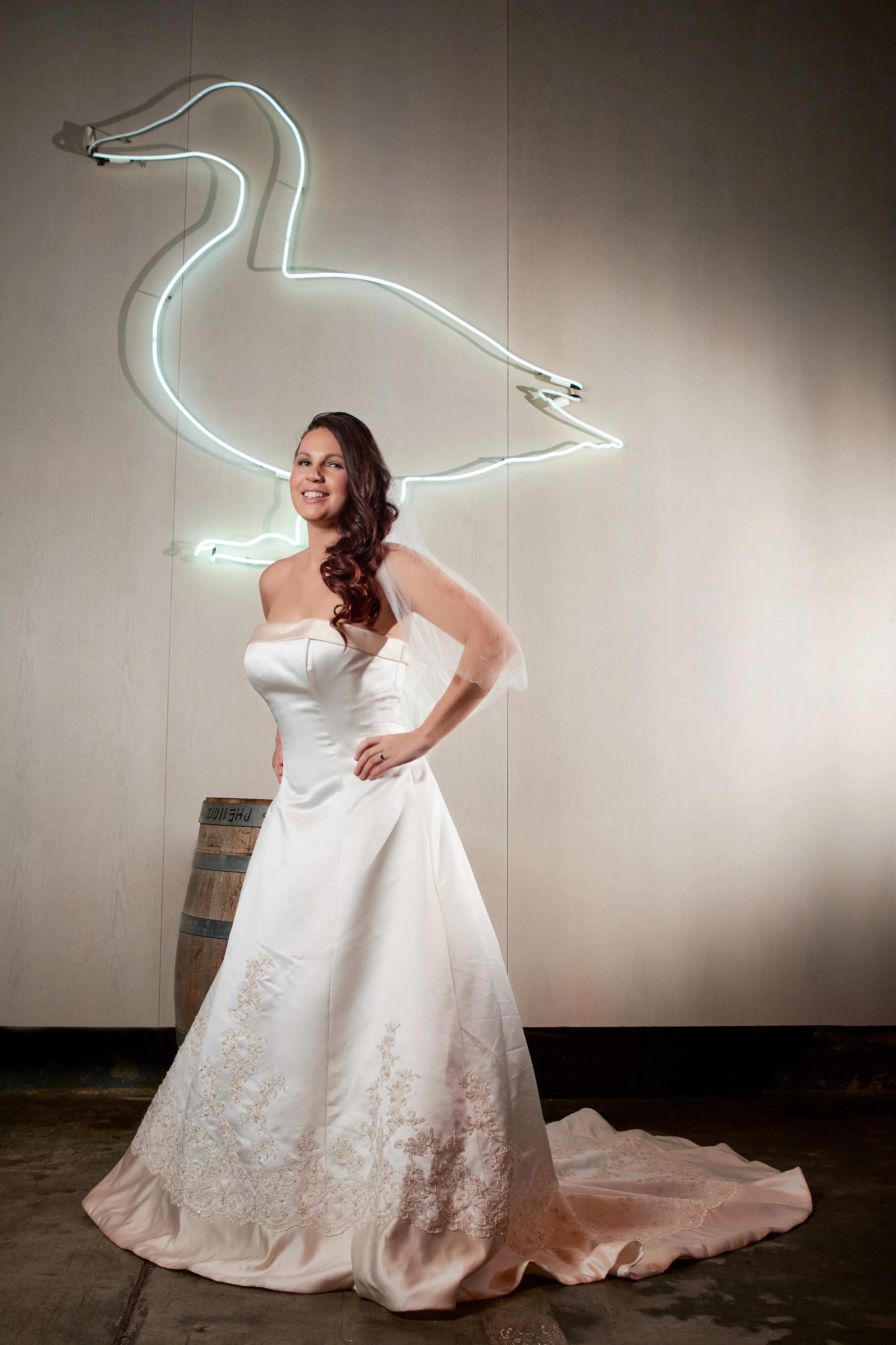 Melbourne wedding photography Red Hill Epicurean bride in front of duck