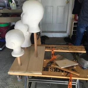 Almost done assembling the head display stand after we drilled holes for the rods.