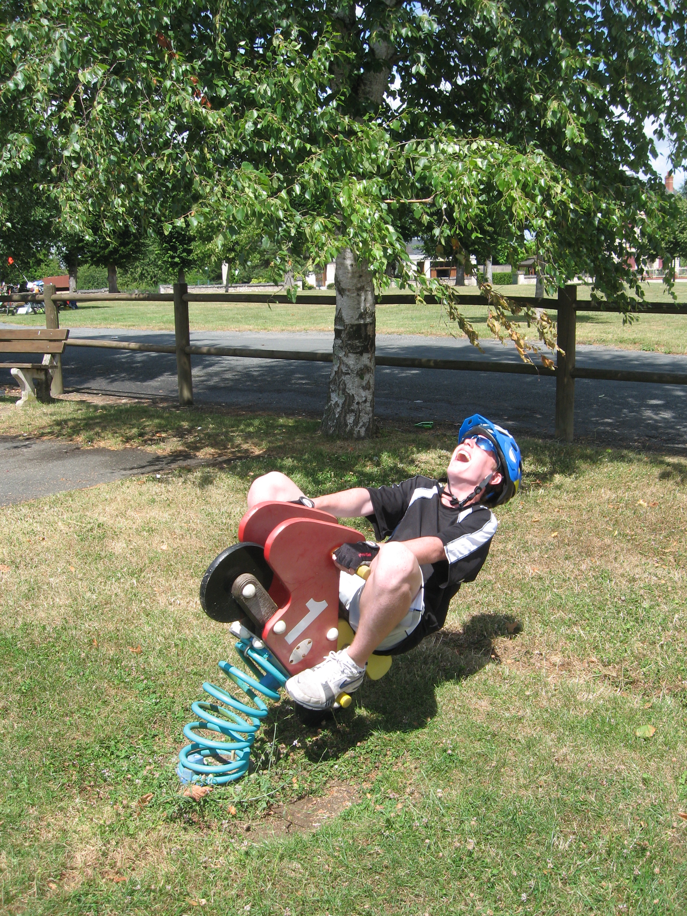 young person enjoying playground