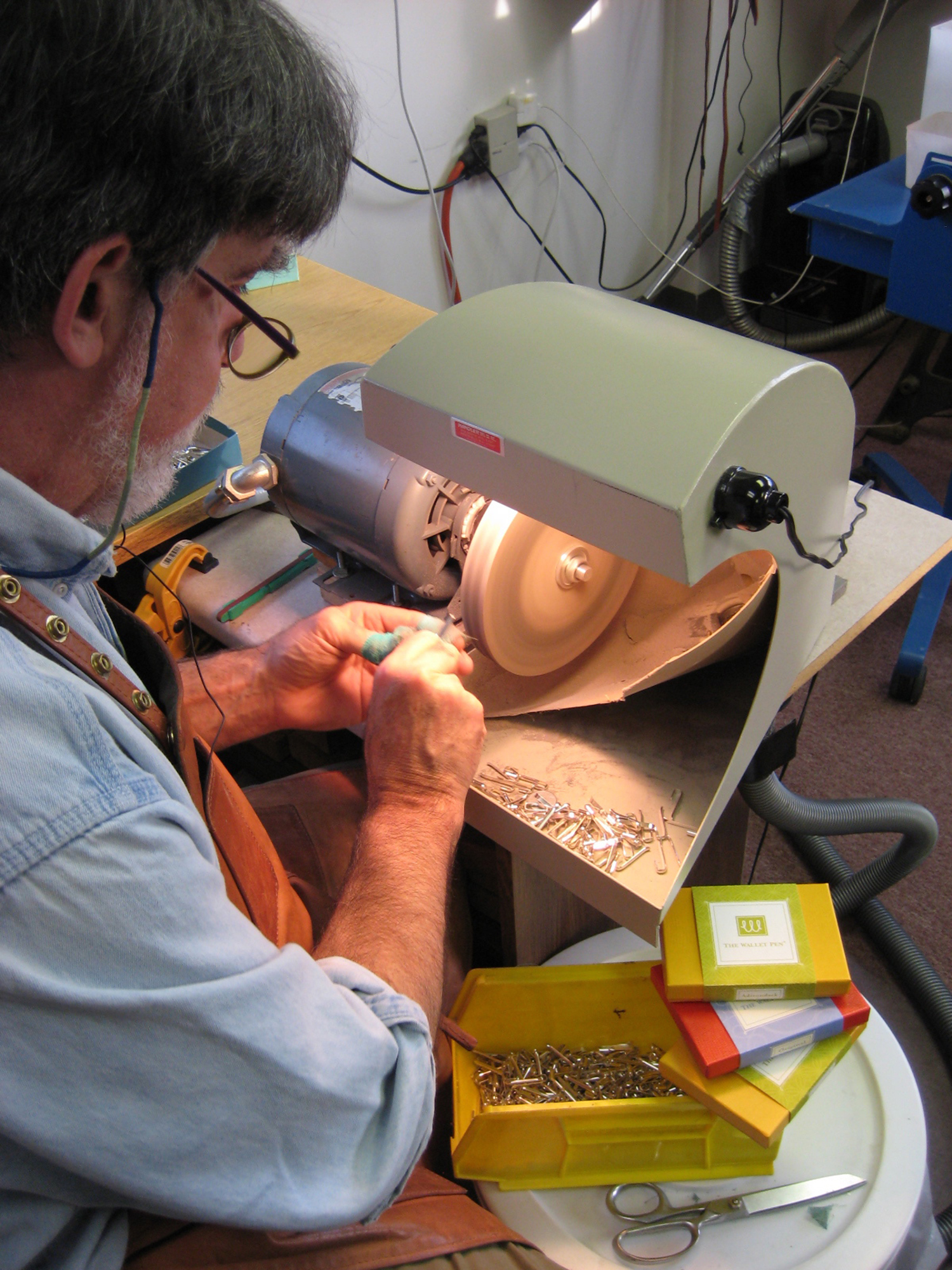 Hand crafting wallet pen in VT workshop
