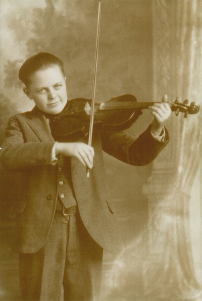 Charlie Pike, c. 1923. Why does his bow look so long?