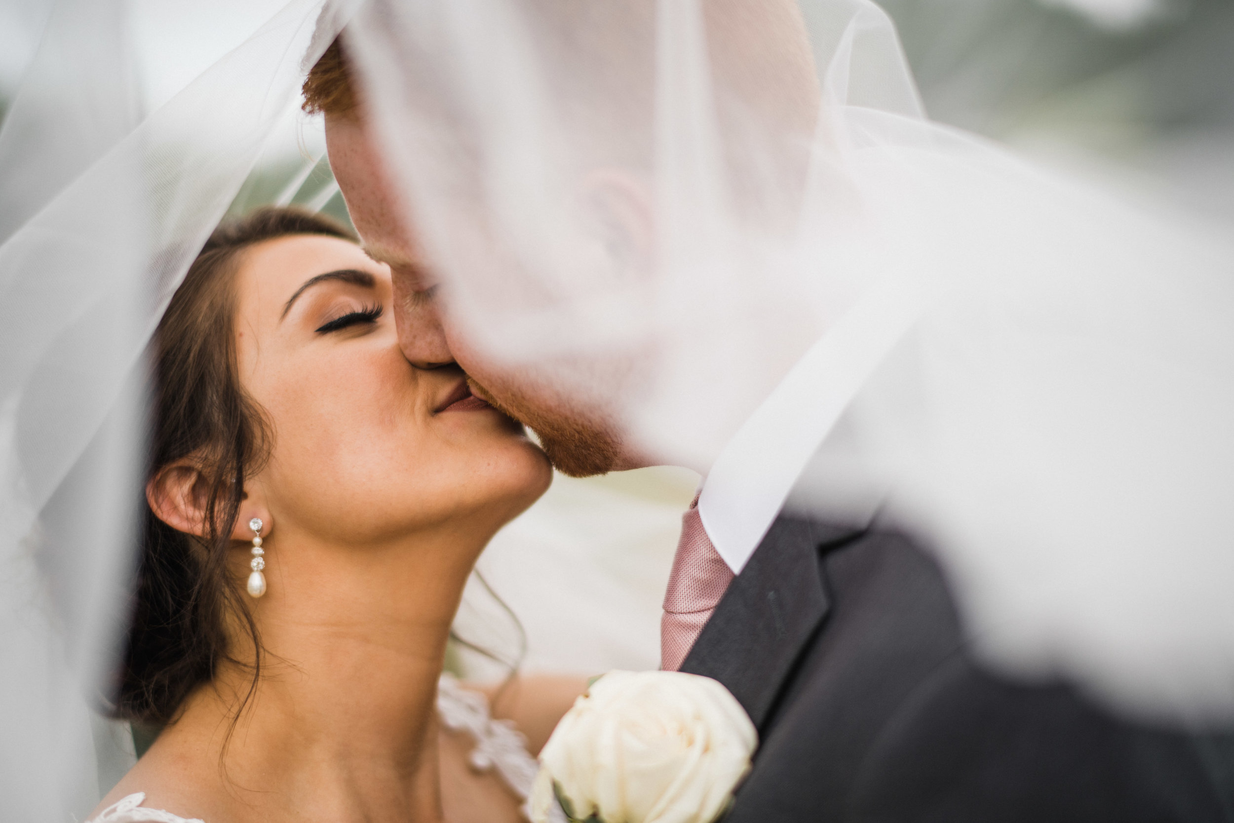 Romantic Veil Shot of Bride and Groom | Des Moines, IA Photographer Austin Day