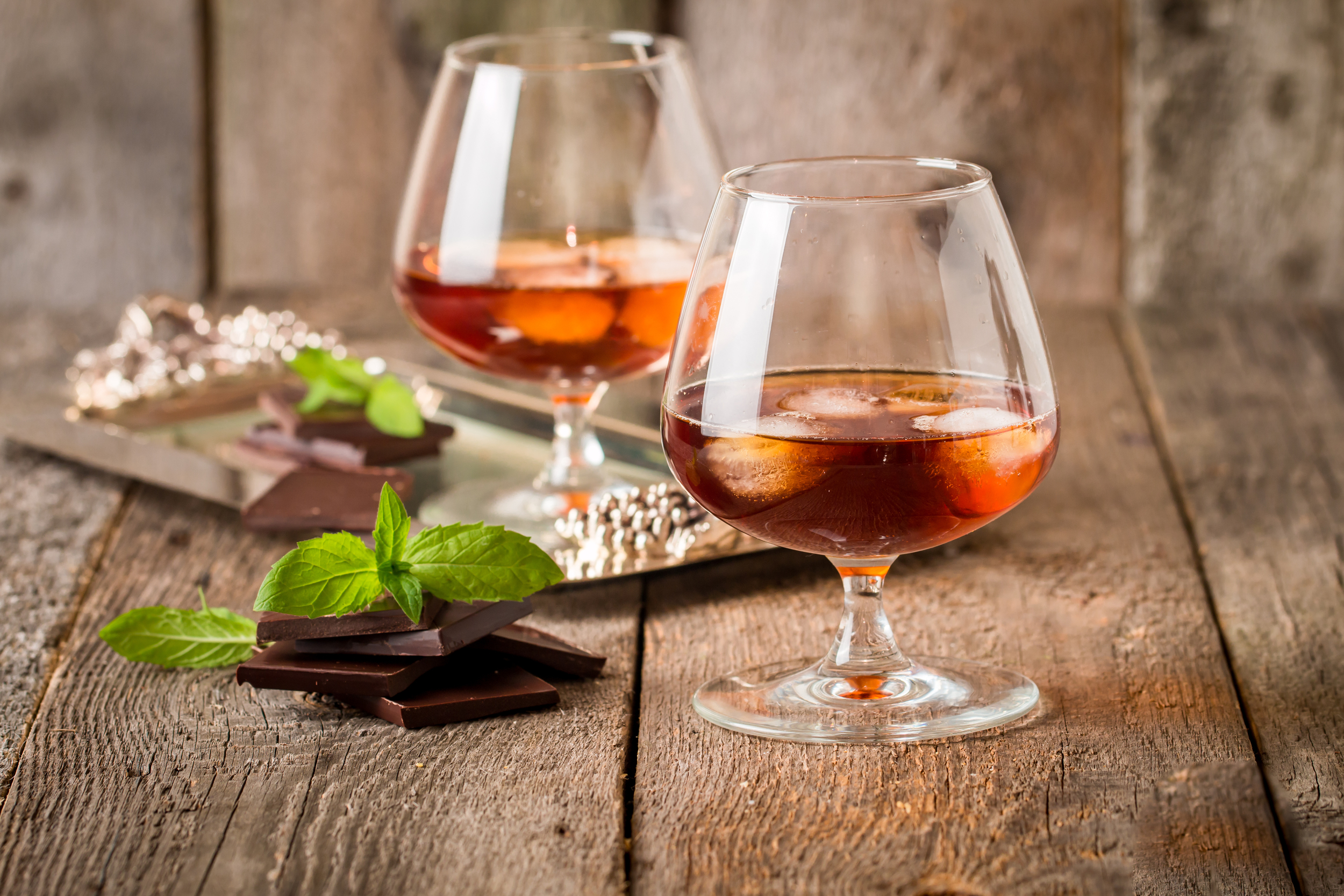 stock-photo-vintage-cognac-still-life-with-chocolate-on-wooden-background-343544321.jpg