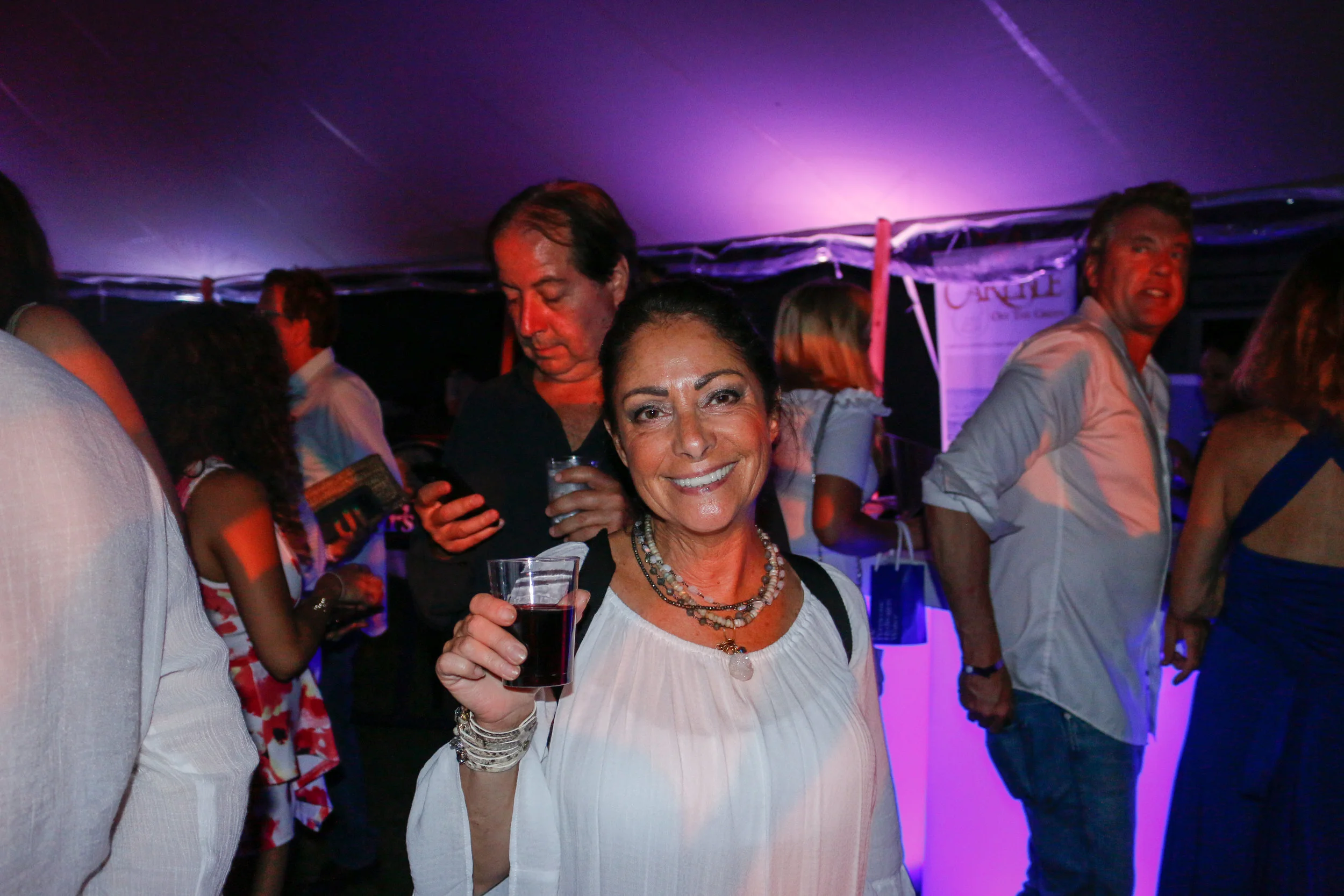 Beautiful people gathered on a beautiful night for a good time in Bridgehampton, New York.