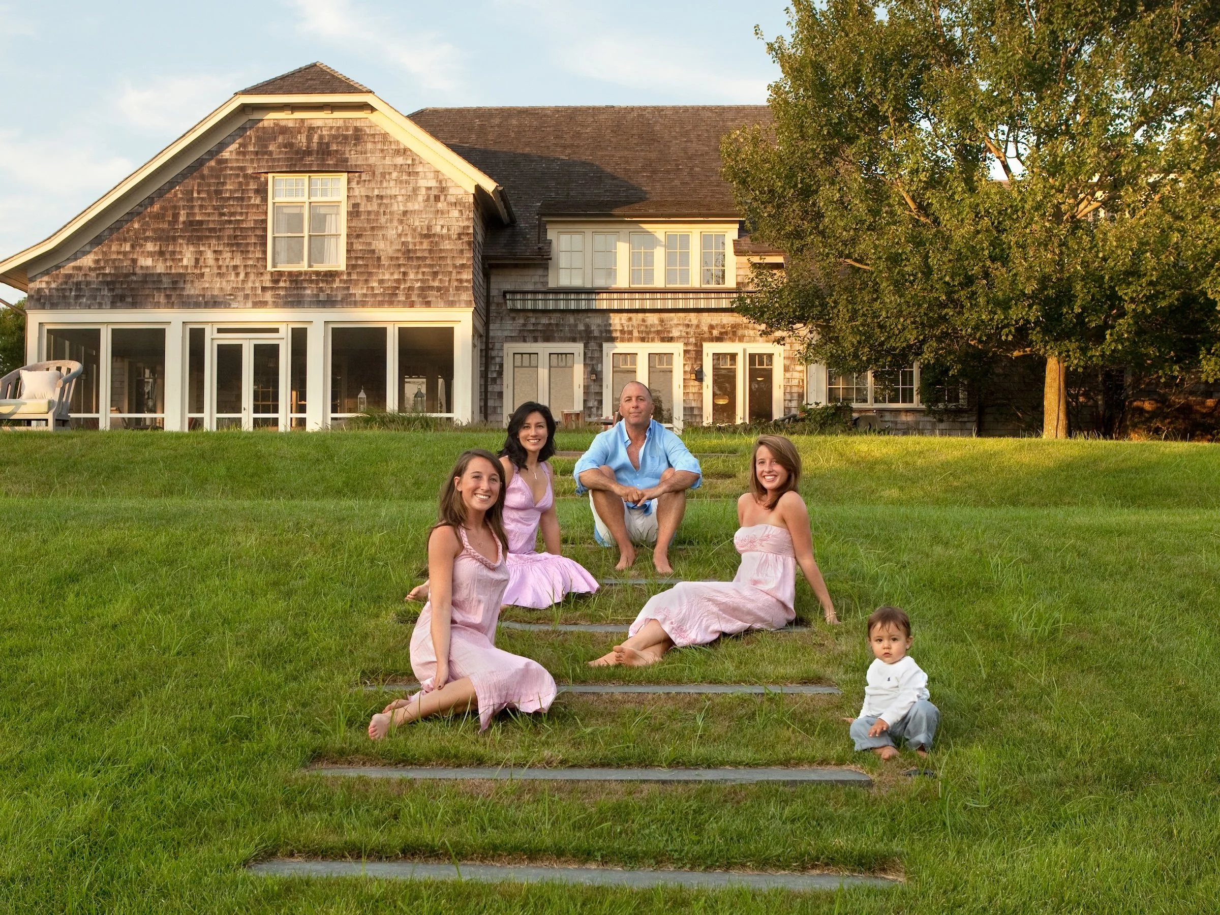 Family portrait on a private  estate in Bridgehampton, Relaxed at golden hour