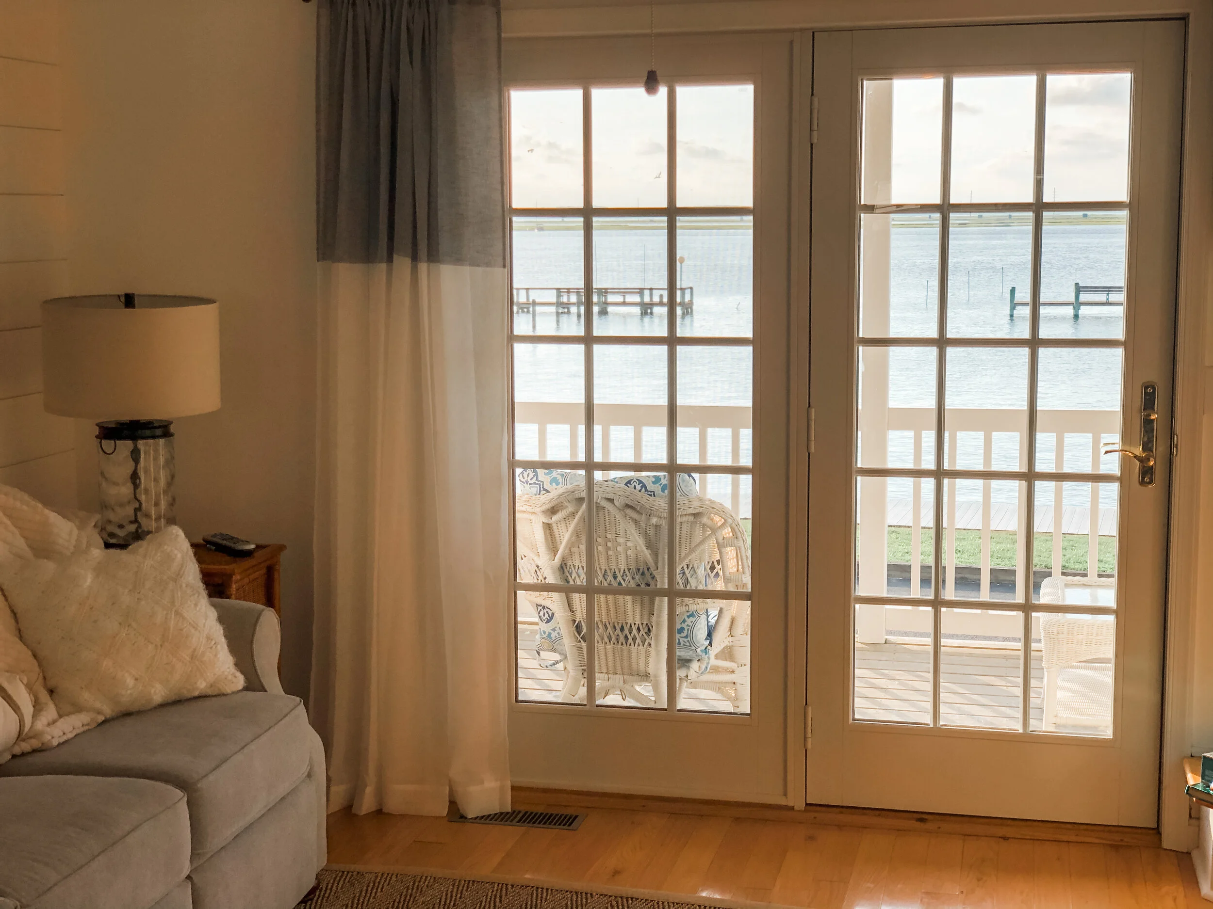 Farm to Bay Living Room Doors Overlooking Bay
