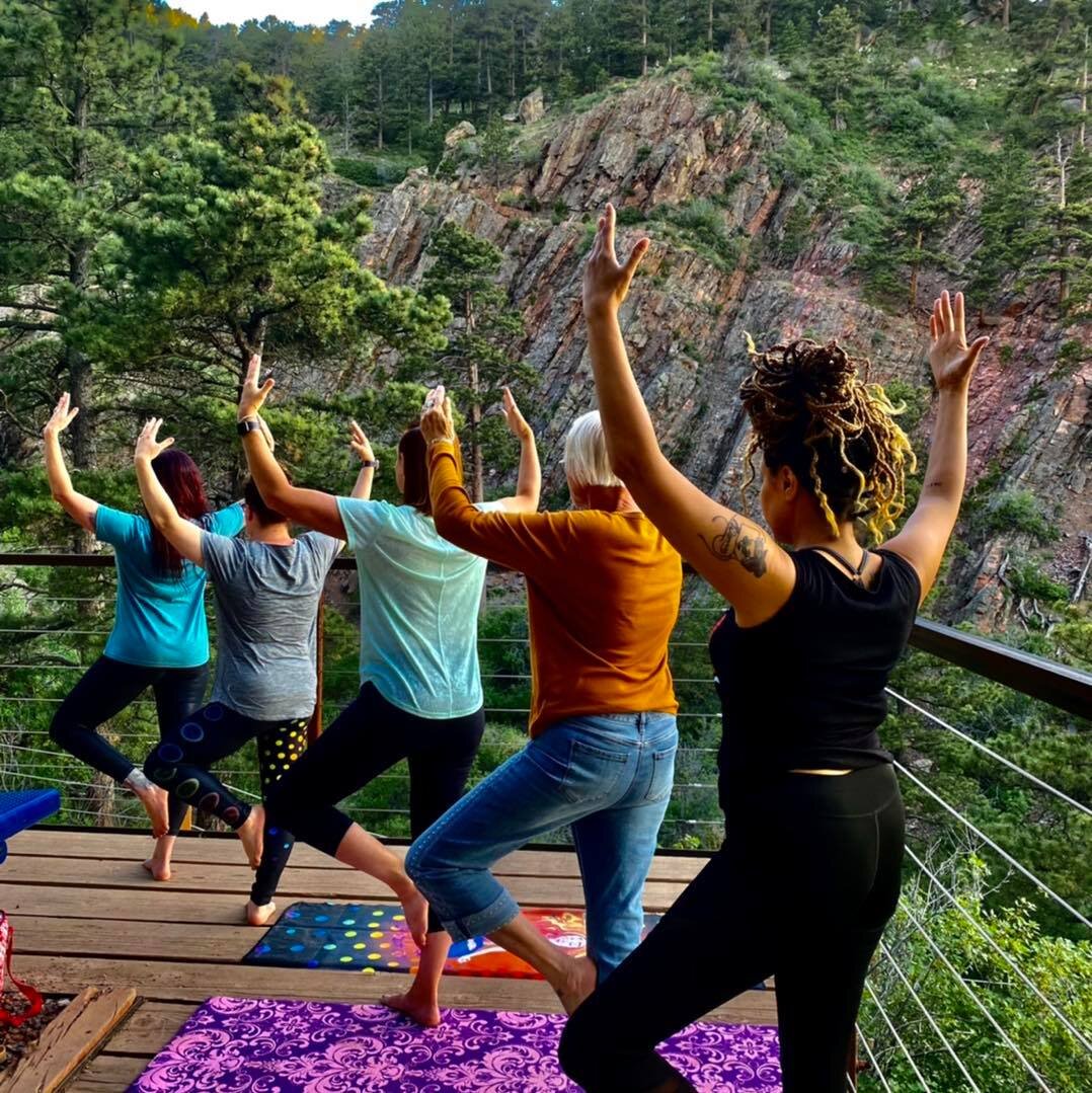 yoga on the mountain with ambassadors.jpeg