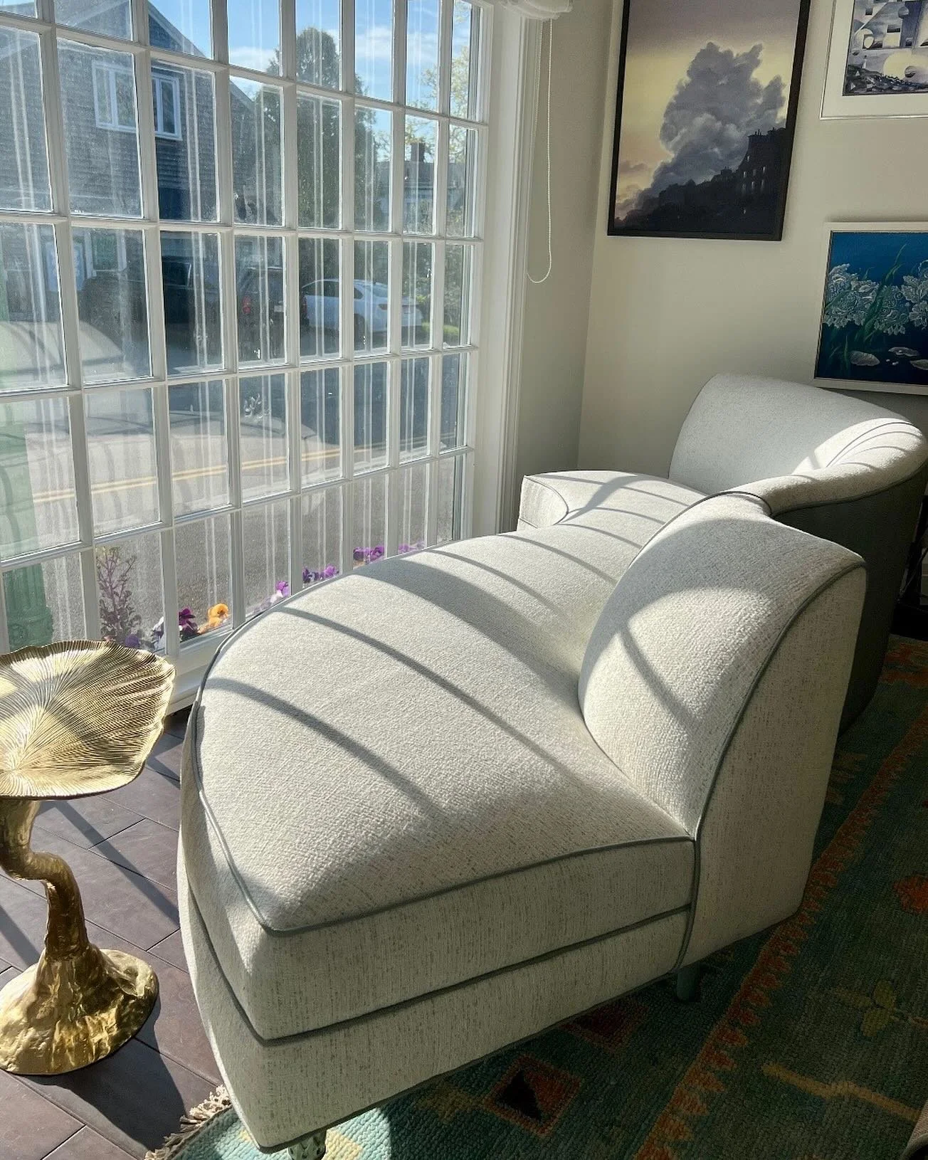 My Friday afternoon lounging spot. My home away from home. I had this awesome antique sofa reupholstered for my new design studio with a @thibaut_1886 performance fabric front and a @kravetinc faux croc back. Business in the front, party in the back.